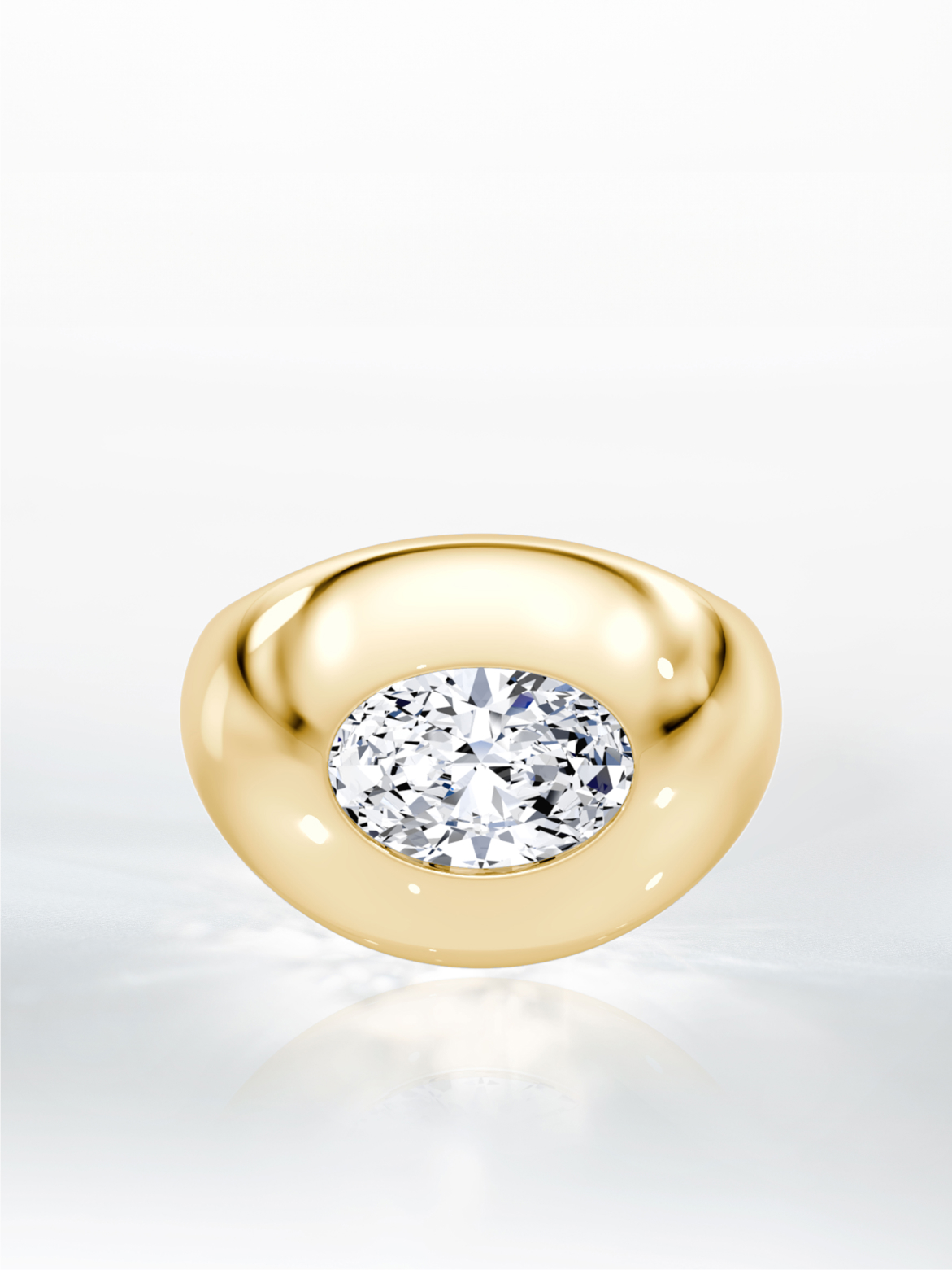 A close-up image of a gold Petite Oval Dome Band.