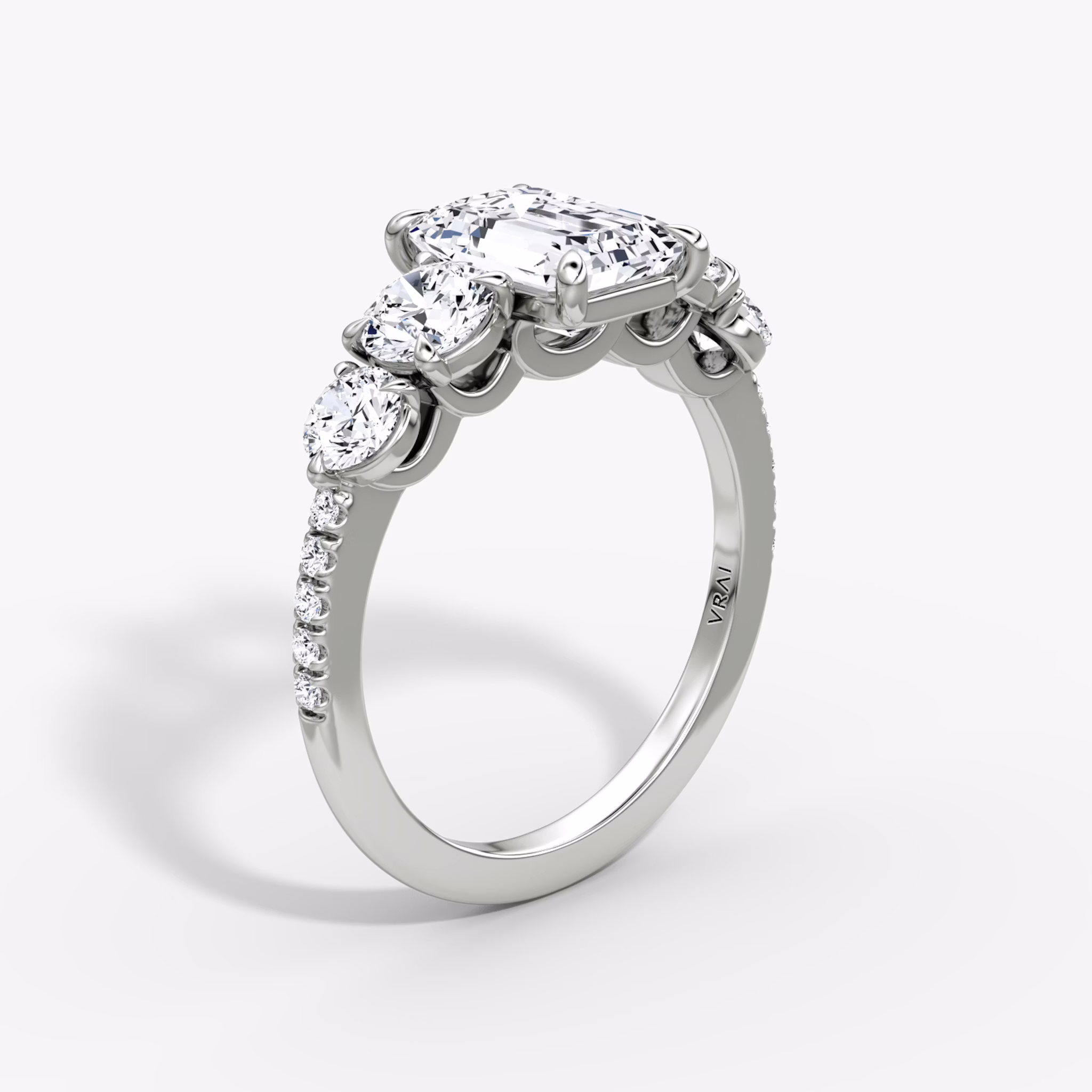 The Signature Five Stone | Emerald | 18k | White Gold | bandAccent: Pavé | diamondOrientation: vertical | caratWeight: other