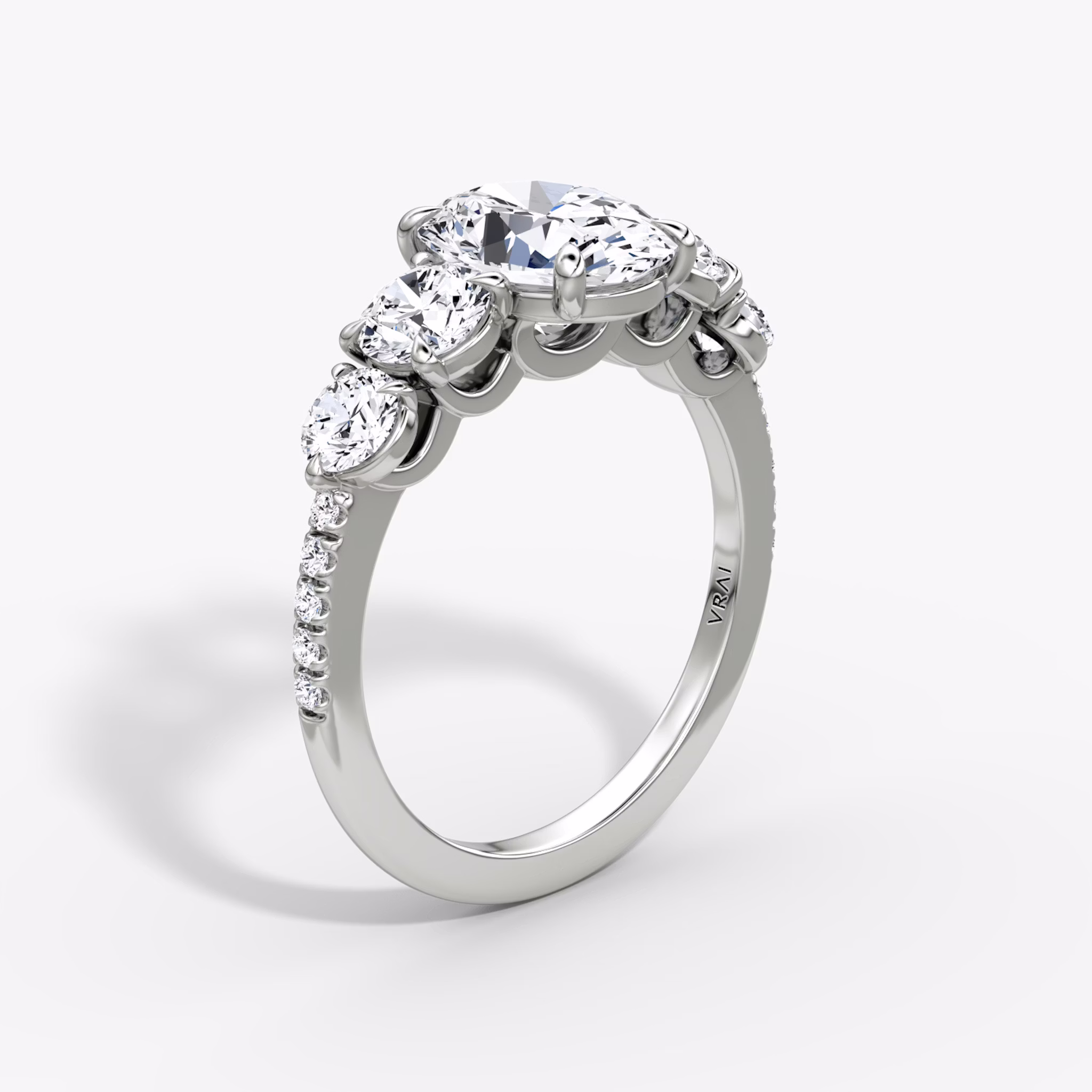 The Signature Five Stone | Oval | 18k | White Gold | bandAccent: Pavé | diamondOrientation: vertical | caratWeight: other