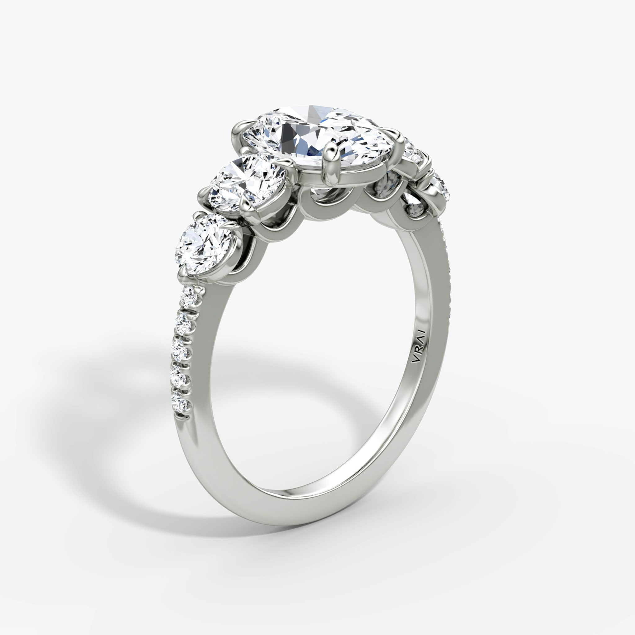 The Signature Five Stone | Oval | 18k | White Gold | bandAccent: Pavé | diamondOrientation: vertical | caratWeight: other