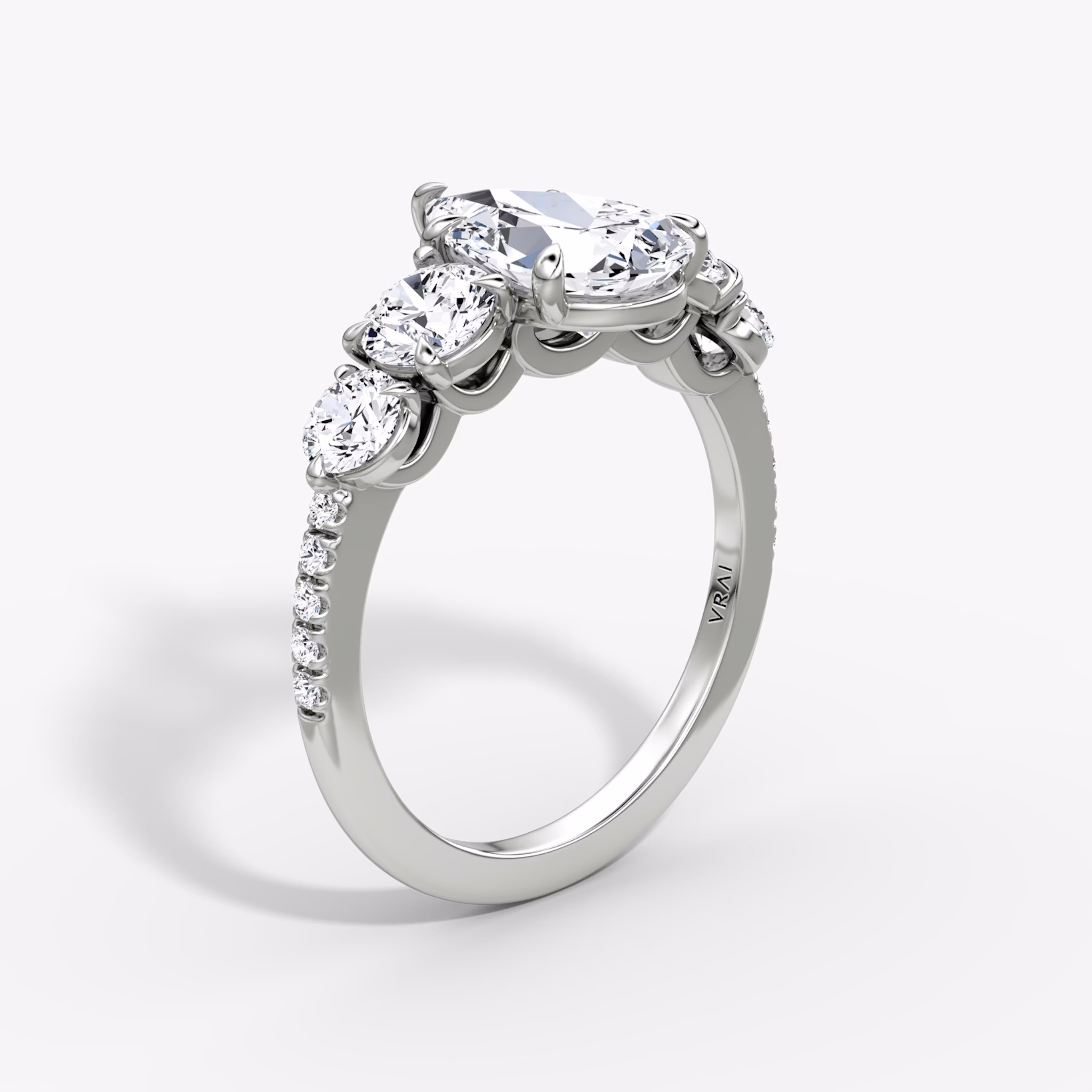 The Signature Five Stone | Pear | 18k | White Gold | bandAccent: Pavé | diamondOrientation: vertical | caratWeight: other
