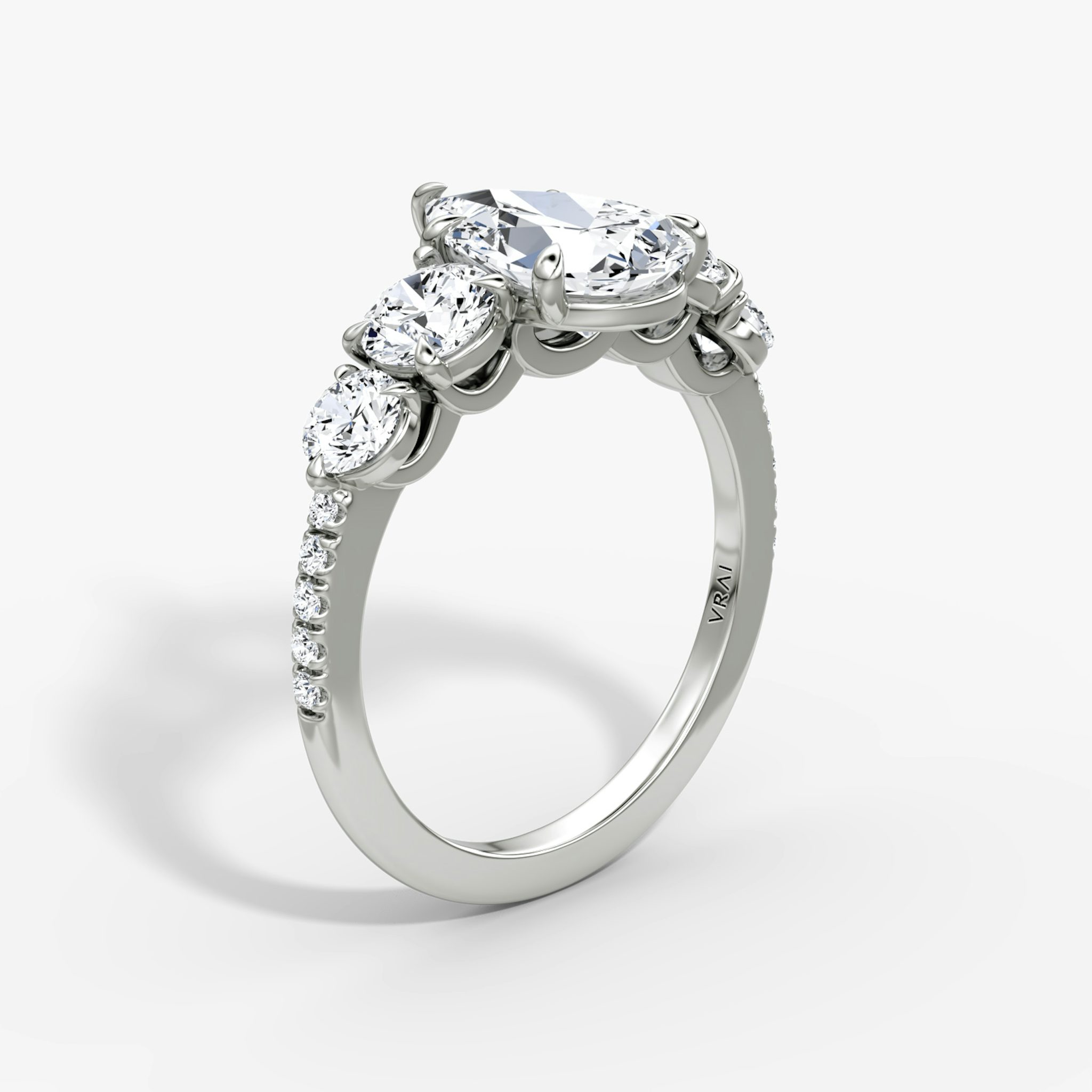 The Signature Five Stone | Pear | 18k | White Gold | bandAccent: Pavé | diamondOrientation: vertical | caratWeight: other