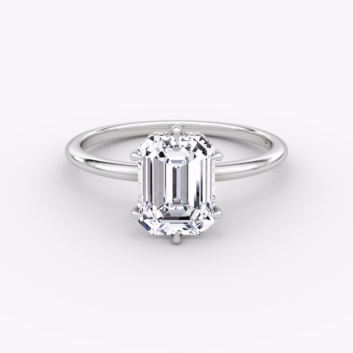 The Signature 6 Prong | Emerald | Platinum | bandAccent: Plain | bandWidth: standard | hiddenHalo: yes | diamondOrientation: vertical | caratWeight: other