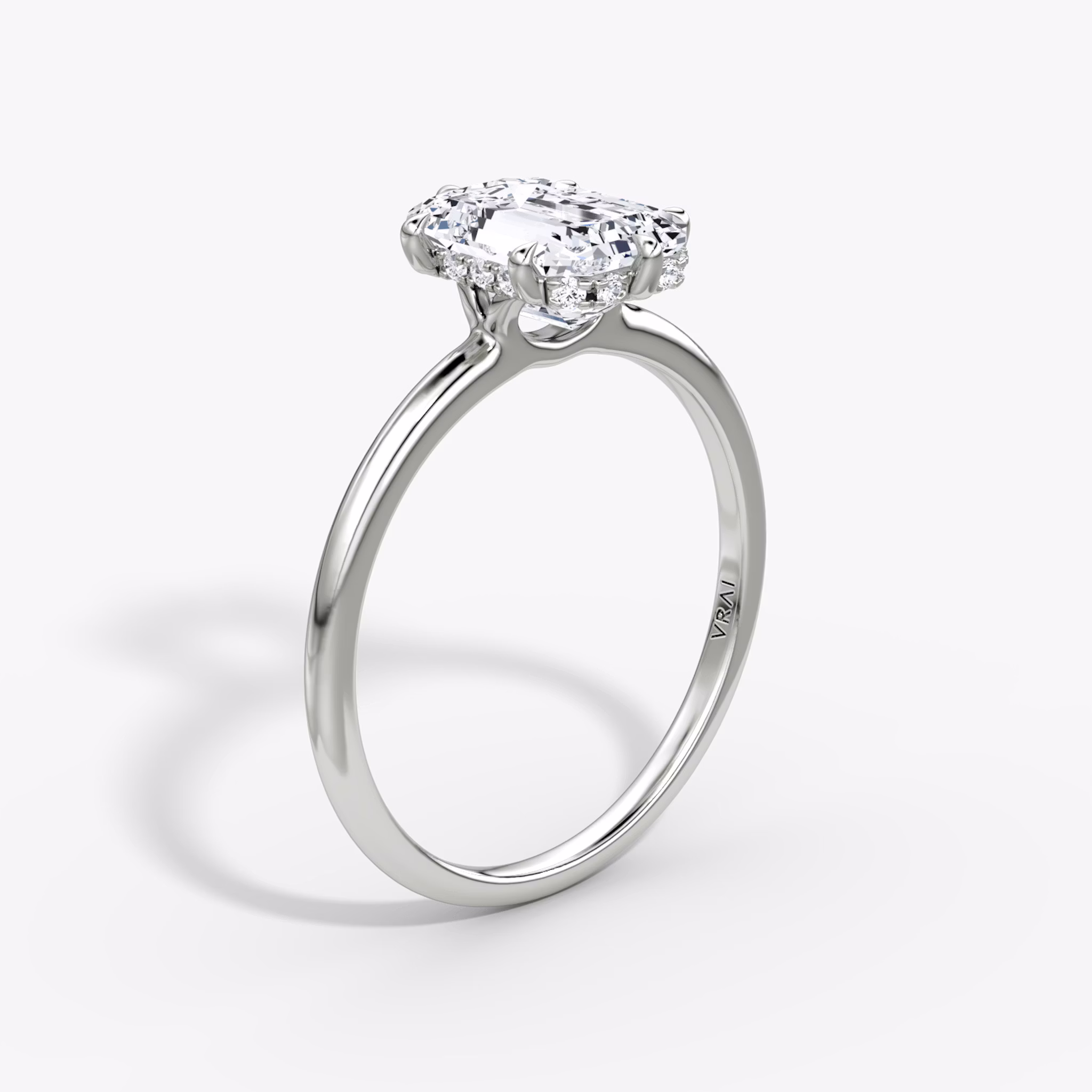 The Signature 6 Prong | Emerald | 18k | White Gold | bandAccent: Plain | bandWidth: standard | hiddenHalo: yes | diamondOrientation: vertical | caratWeight: other