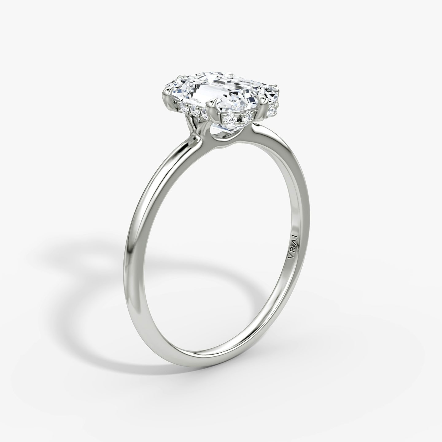 The Signature 6 Prong | Emerald | 18k | White Gold | bandAccent: Plain | bandWidth: standard | hiddenHalo: yes | diamondOrientation: vertical | caratWeight: other