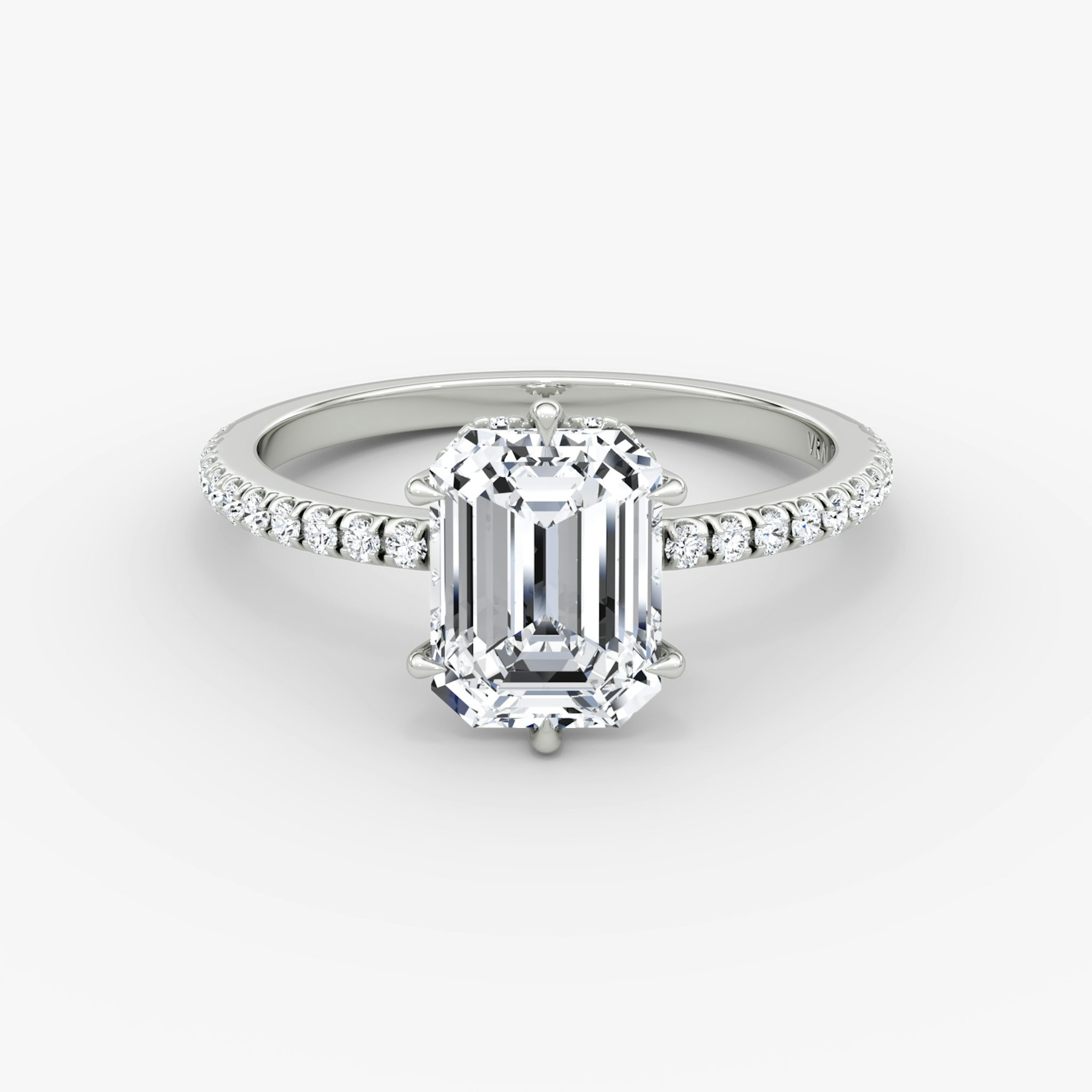 The Signature 6 Prong | Emerald | 18k | White Gold | bandAccent: Pavé | bandWidth: standard | hiddenHalo: yes | diamondOrientation: vertical | caratWeight: other
