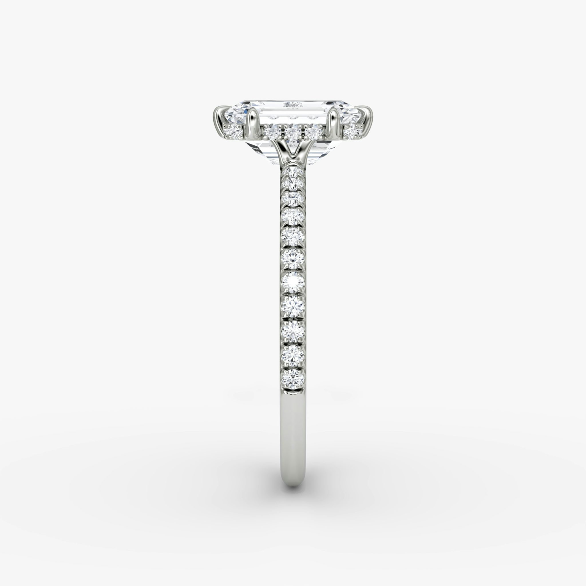 The Signature 6 Prong | Emerald | 18k | White Gold | bandAccent: Pavé | bandWidth: standard | hiddenHalo: yes | diamondOrientation: vertical | caratWeight: other