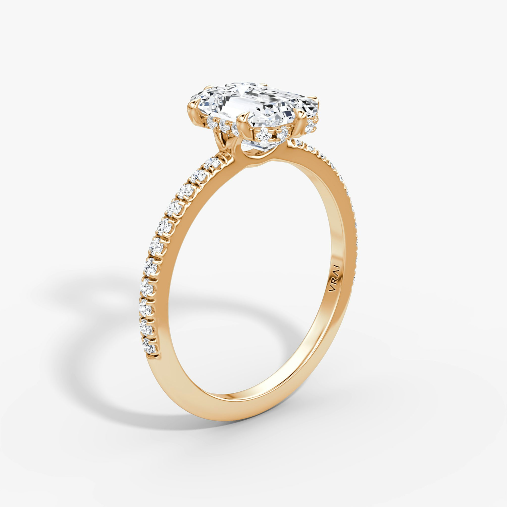 The Signature 6 Prong | Emerald | 14k | Rose Gold | bandAccent: Pavé | bandWidth: standard | hiddenHalo: yes | diamondOrientation: vertical | caratWeight: other