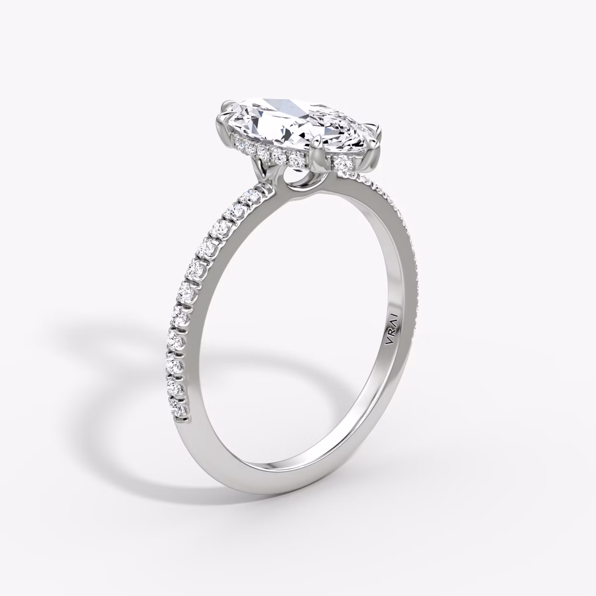 The Signature 6 Prong | Marquise | Platinum | bandAccent: Pavé | bandWidth: standard | hiddenHalo: yes | diamondOrientation: vertical | caratWeight: other