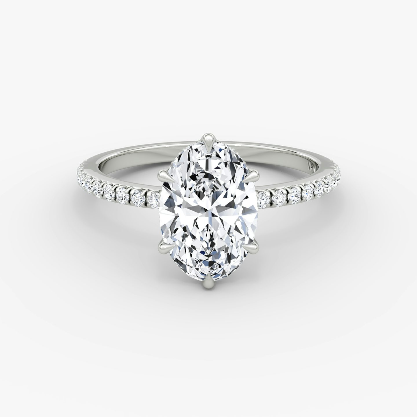 The Signature 6 Prong | Oval | Platinum | bandAccent: Pavé | bandWidth: standard | hiddenHalo: yes | diamondOrientation: vertical | caratWeight: other