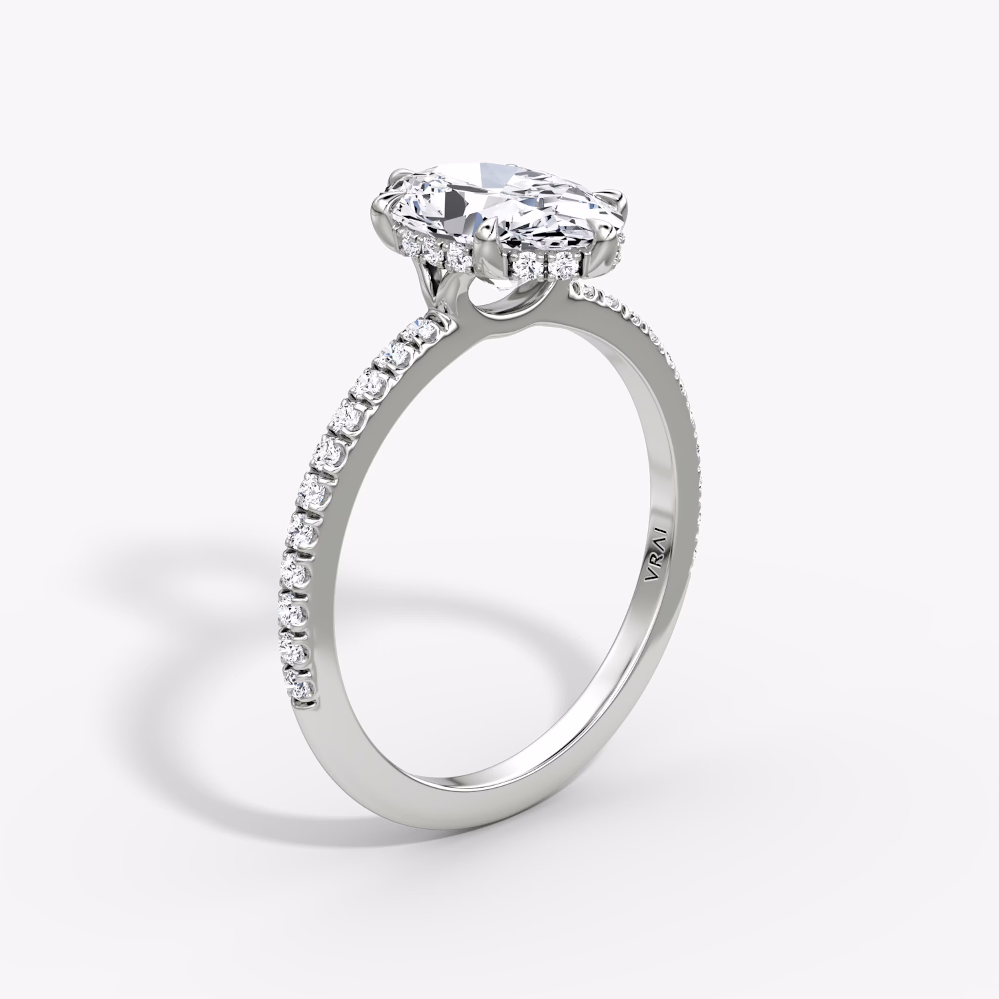 The Signature 6 Prong | Oval | 18k | White Gold | bandAccent: Pavé | bandWidth: standard | hiddenHalo: yes | diamondOrientation: vertical | caratWeight: other