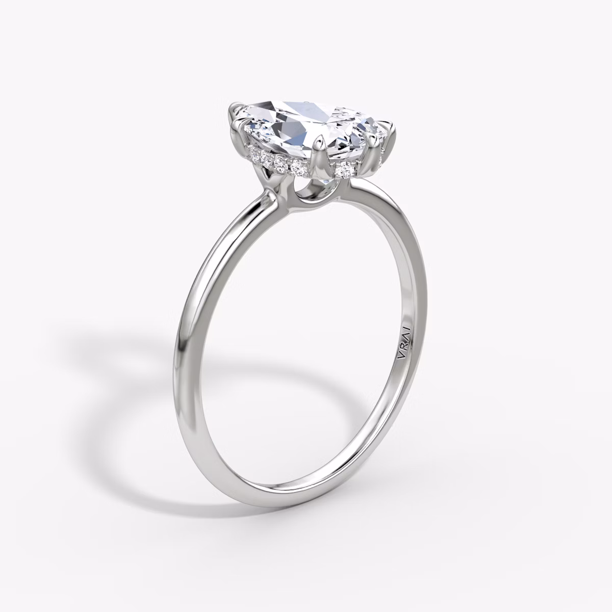 The Signature 6 Prong | Pear | Platinum | bandAccent: Plain | bandWidth: standard | hiddenHalo: yes | diamondOrientation: vertical | caratWeight: other