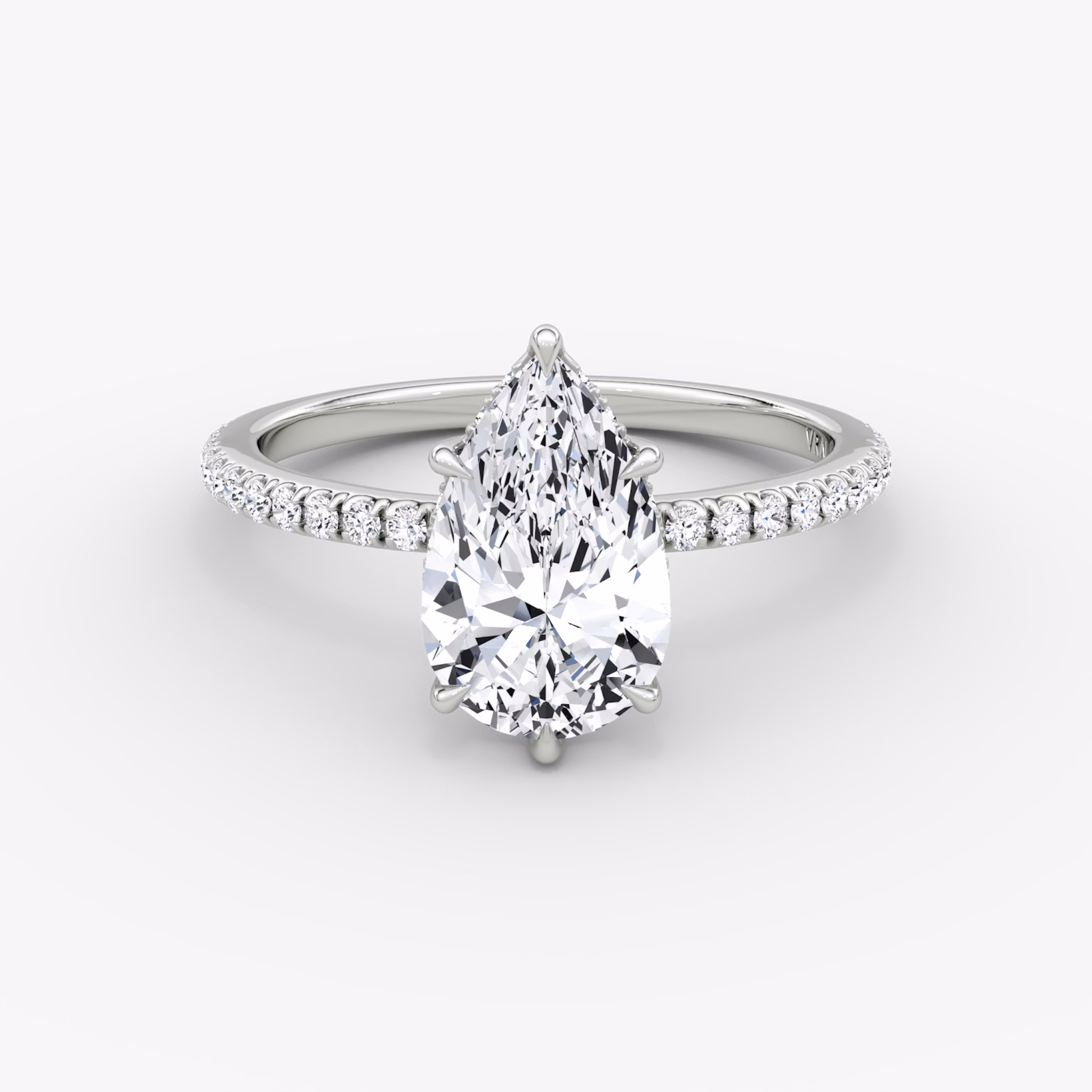 The Signature 6 Prong | Pear | 18k | White Gold | bandAccent: Pavé | bandWidth: standard | hiddenHalo: yes | diamondOrientation: vertical | caratWeight: other