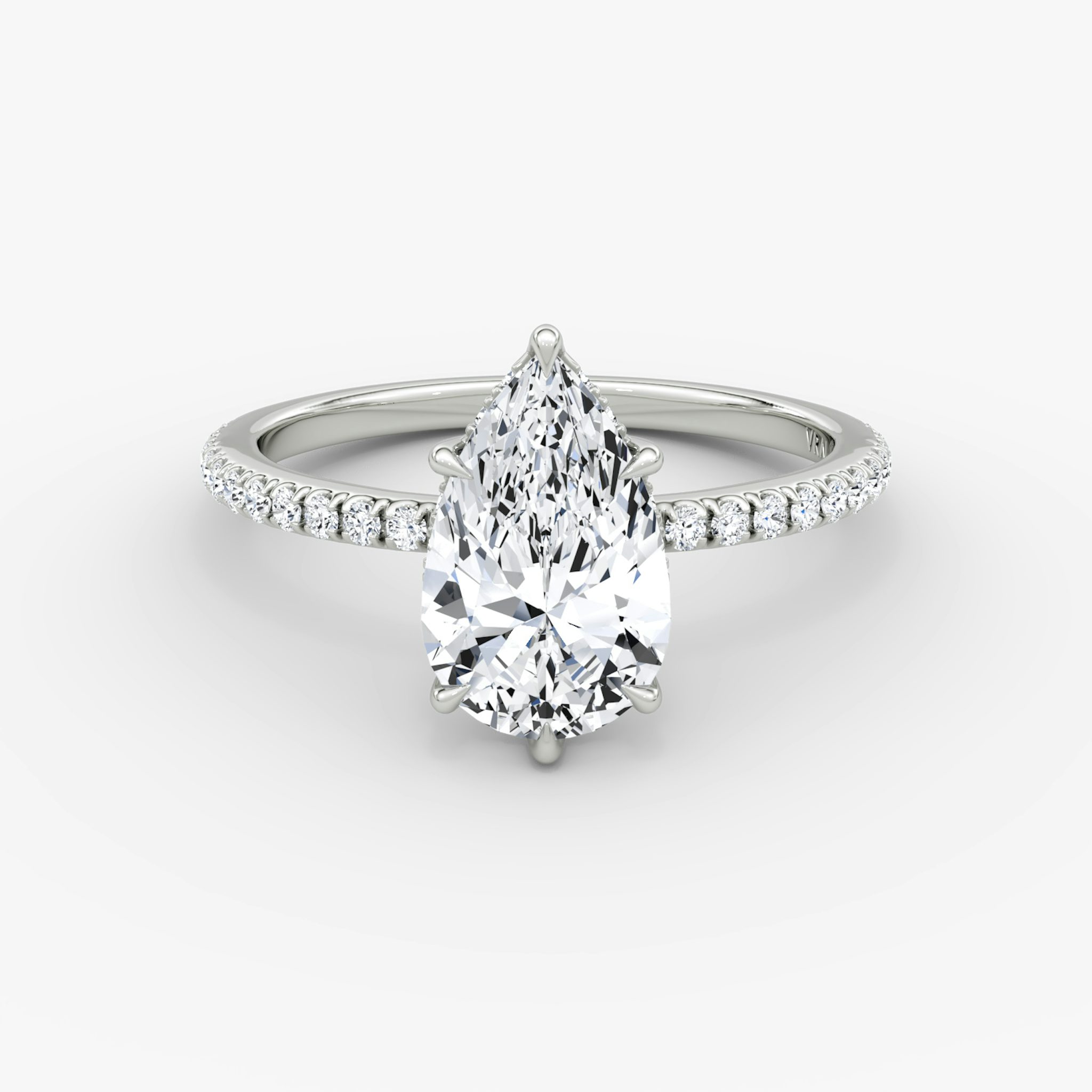 The Signature 6 Prong | Pear | 18k | White Gold | bandAccent: Pavé | bandWidth: standard | hiddenHalo: yes | diamondOrientation: vertical | caratWeight: other