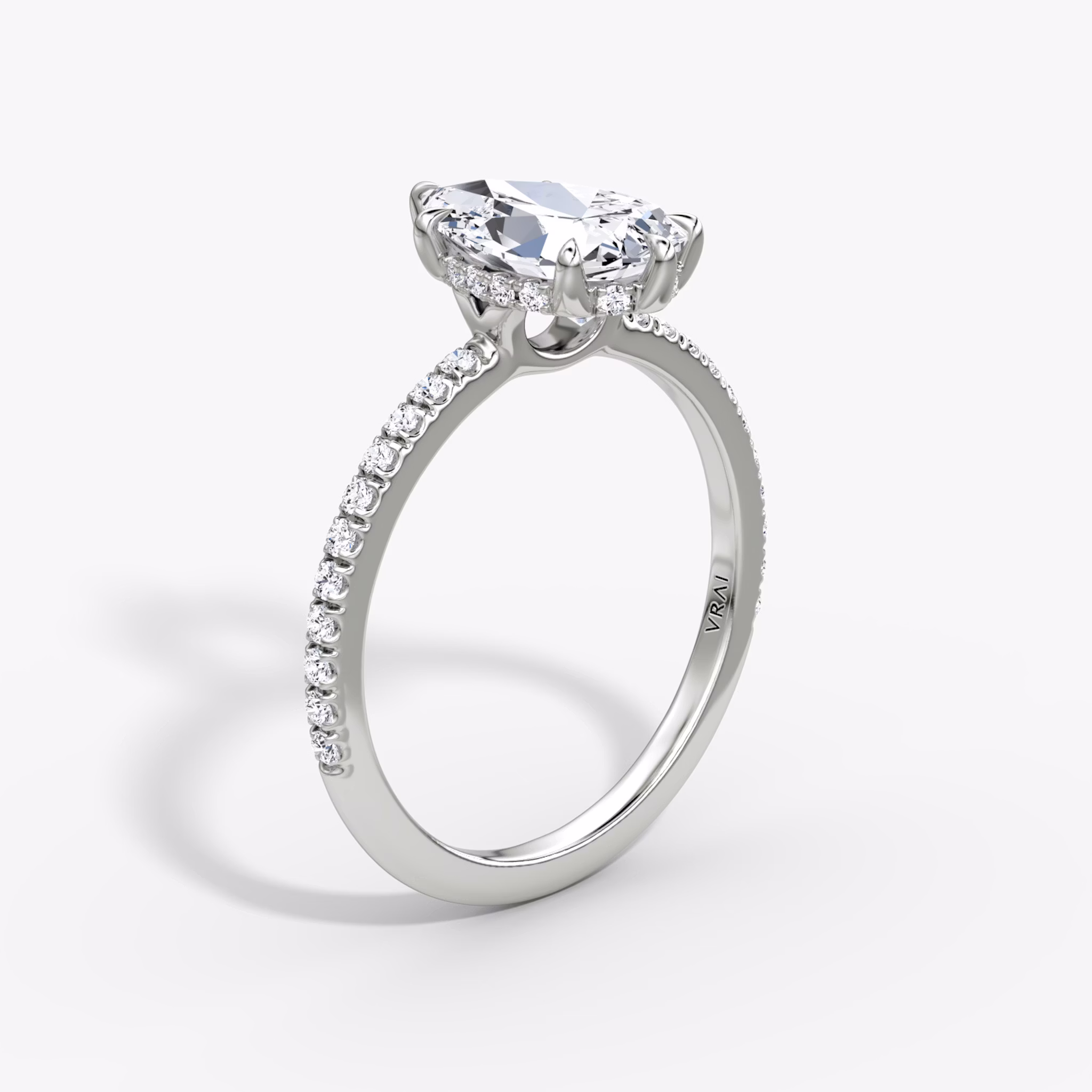 The Signature 6 Prong | Pear | 18k | White Gold | bandAccent: Pavé | bandWidth: standard | hiddenHalo: yes | diamondOrientation: vertical | caratWeight: other