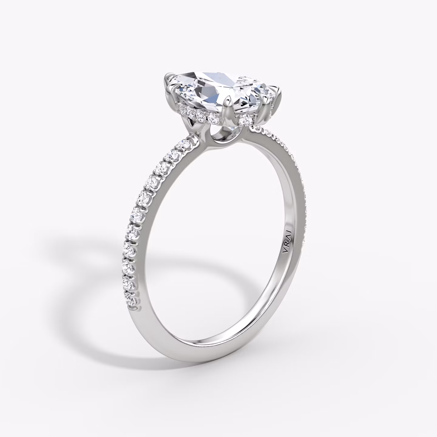 The Signature 6 Prong | Pear | Platinum | bandAccent: Pavé | bandWidth: standard | hiddenHalo: yes | diamondOrientation: vertical | caratWeight: other