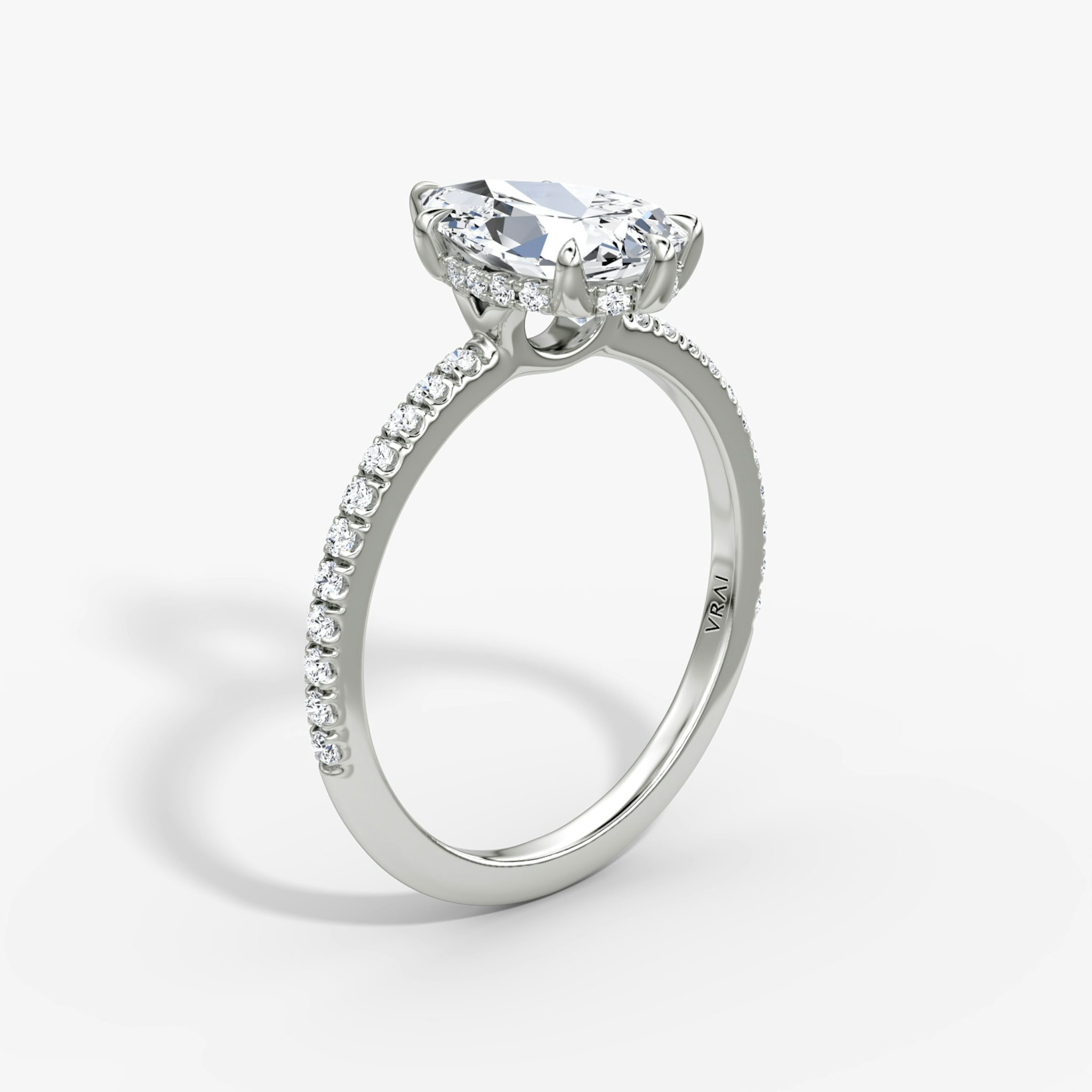 The Signature 6 Prong | Pear | 18k | White Gold | bandAccent: Pavé | bandWidth: standard | hiddenHalo: yes | diamondOrientation: vertical | caratWeight: other
