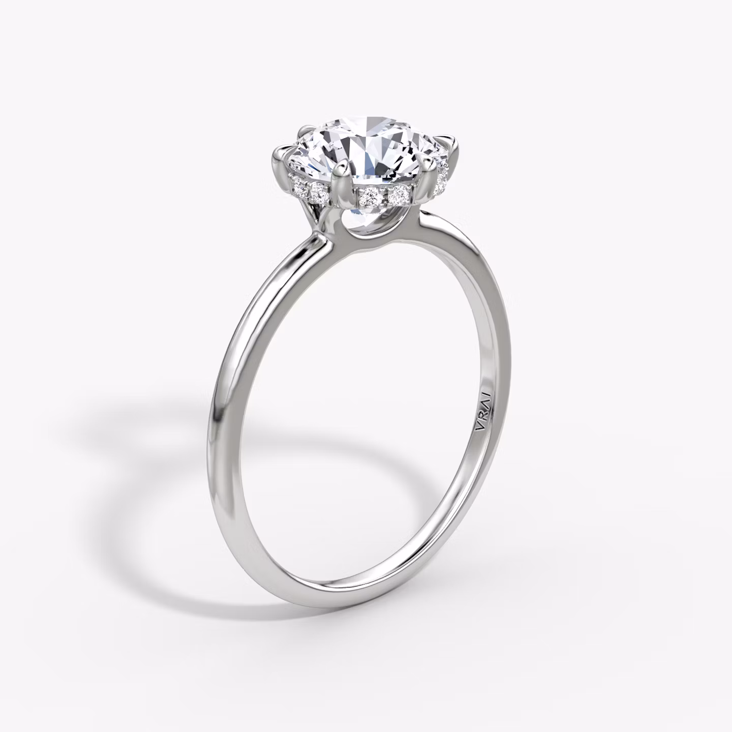 The Signature 6 Prong | Round Brilliant | 18k | White Gold | bandAccent: Plain | bandWidth: standard | caratWeight: 2.0ct | hiddenHalo: yes | diamondOrientation: vertical