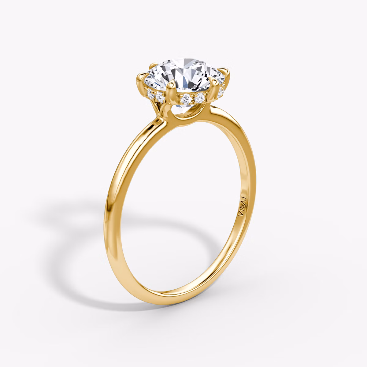The Signature 6 Prong | Round Brilliant | 18k | Yellow Gold | bandAccent: Plain | bandWidth: standard | caratWeight: 1.5ct | hiddenHalo: yes | diamondOrientation: vertical