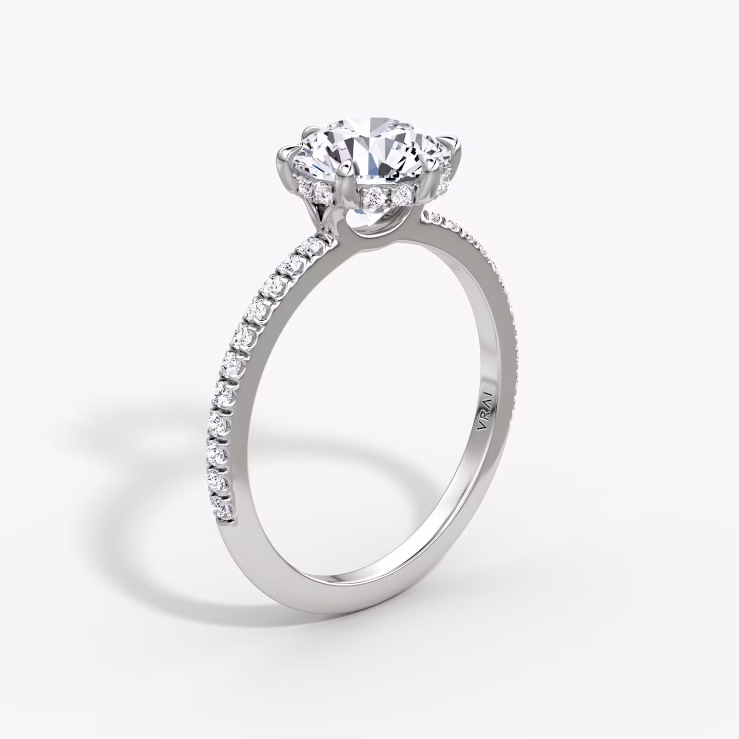 The Signature 6 Prong | Round Brilliant | Platinum | bandAccent: Pavé | bandWidth: standard | caratWeight: 2.0ct | hiddenHalo: yes | diamondOrientation: vertical