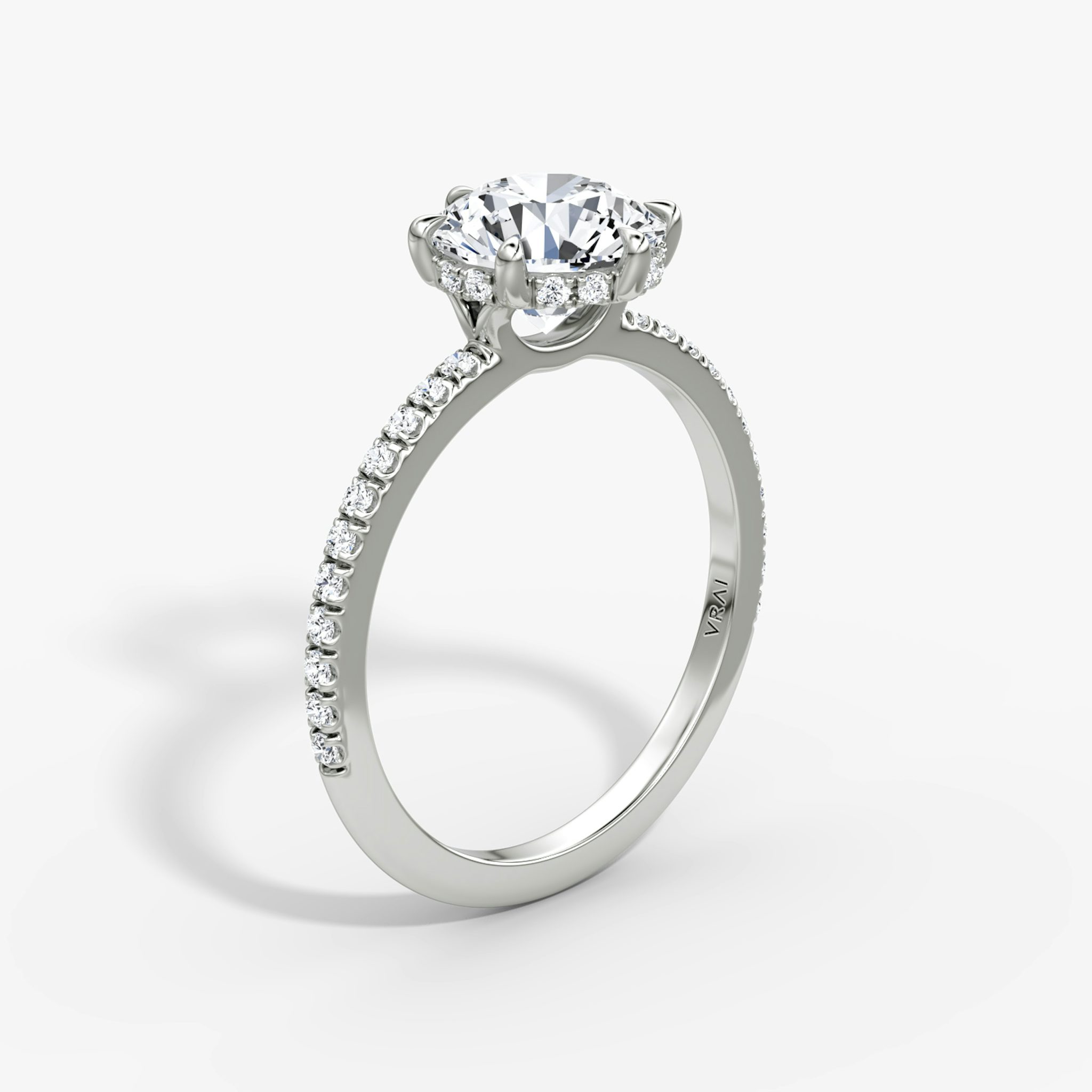 The Signature 6 Prong | Round Brilliant | 18k | White Gold | bandAccent: Pavé | bandWidth: standard | caratWeight: other | hiddenHalo: yes | diamondOrientation: vertical