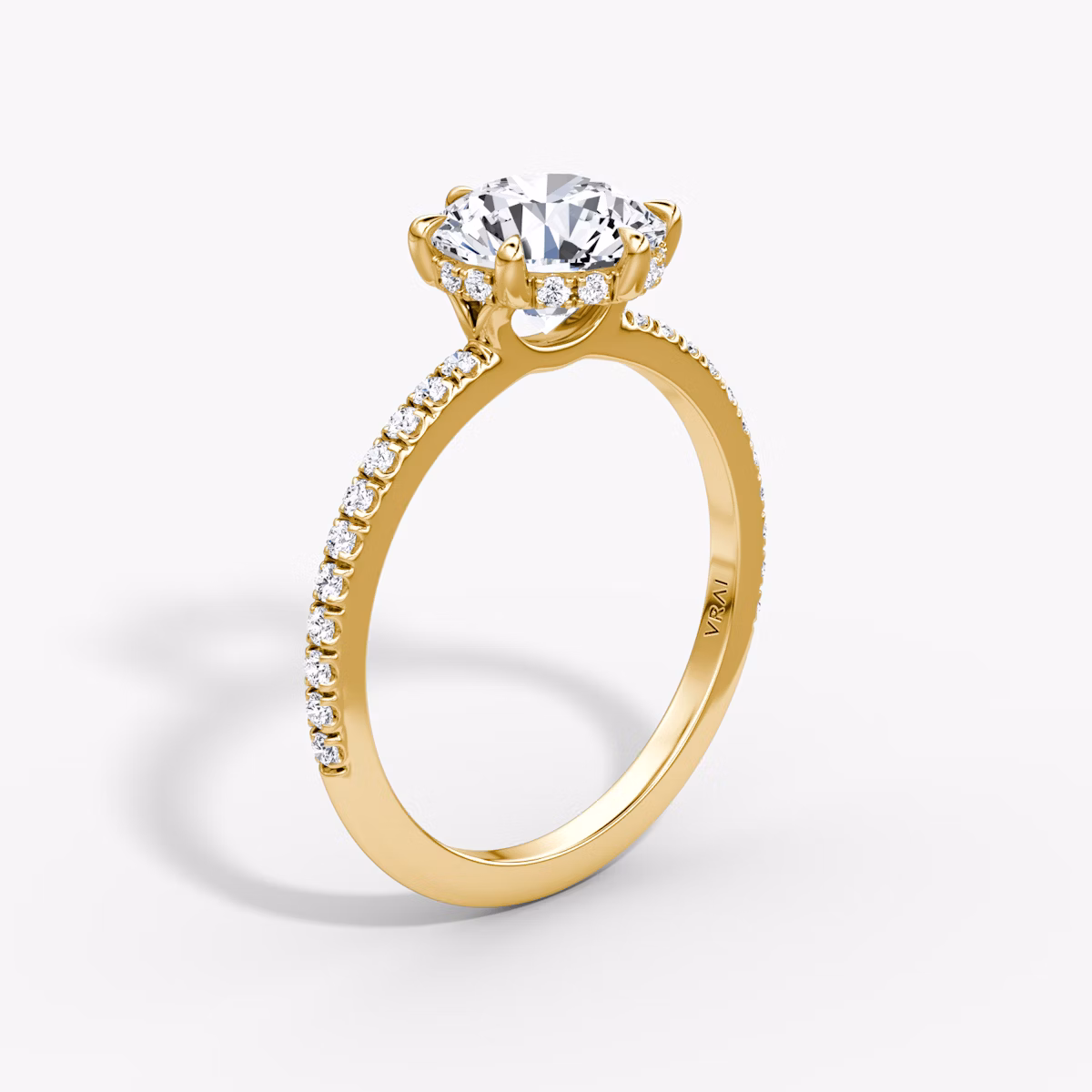 The Signature 6 Prong | Round Brilliant | 18k | Yellow Gold | bandAccent: Pavé | bandWidth: standard | caratWeight: 1.0ct | hiddenHalo: yes | diamondOrientation: vertical