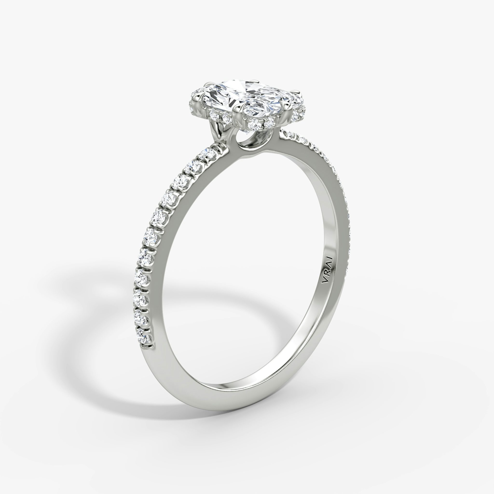 The Signature 6 Prong | Radiant | 18k | White Gold | bandAccent: Pavé | bandWidth: standard | hiddenHalo: yes | diamondOrientation: vertical | caratWeight: other