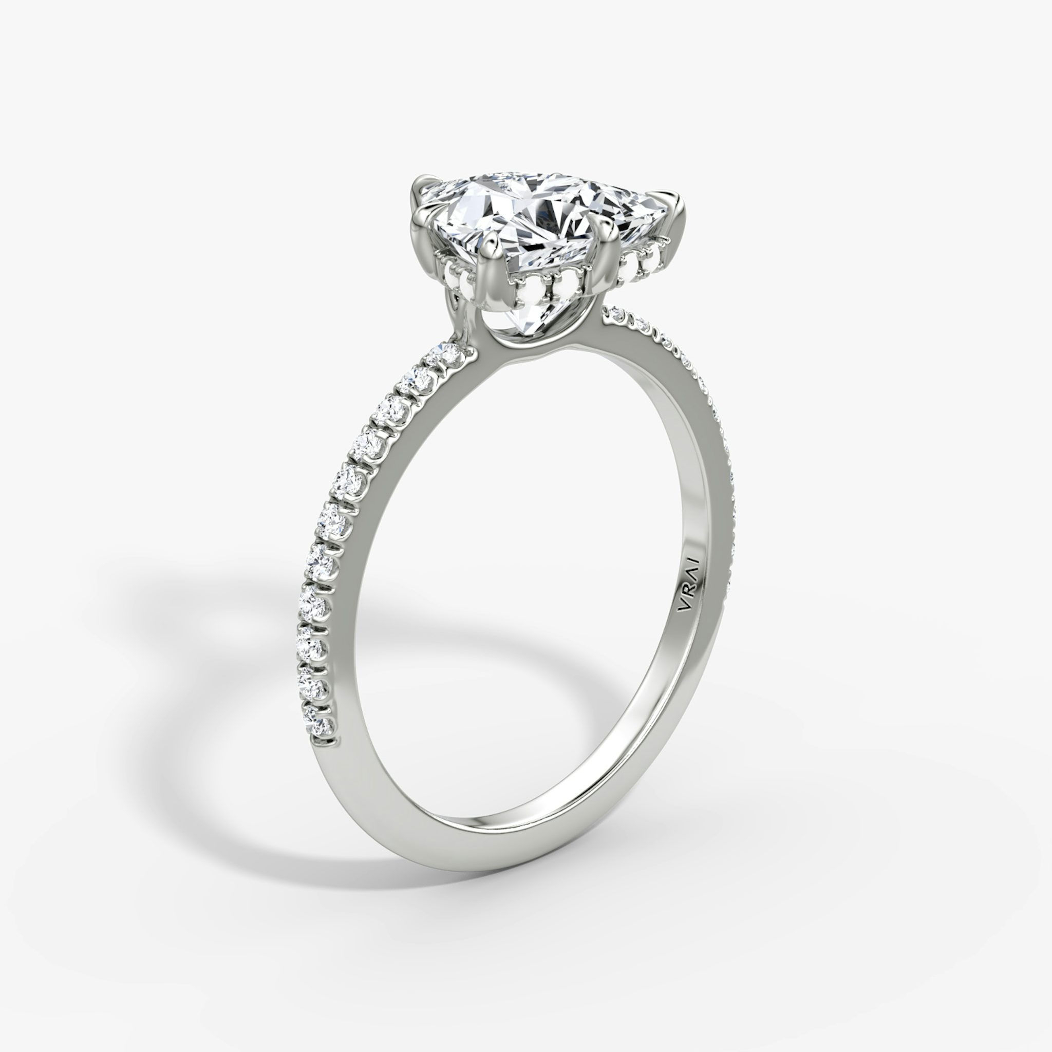 The Signature 6 Prong | Trillion | 18k | White Gold | bandAccent: Pavé | bandWidth: standard | hiddenHalo: yes | diamondOrientation: vertical | caratWeight: other