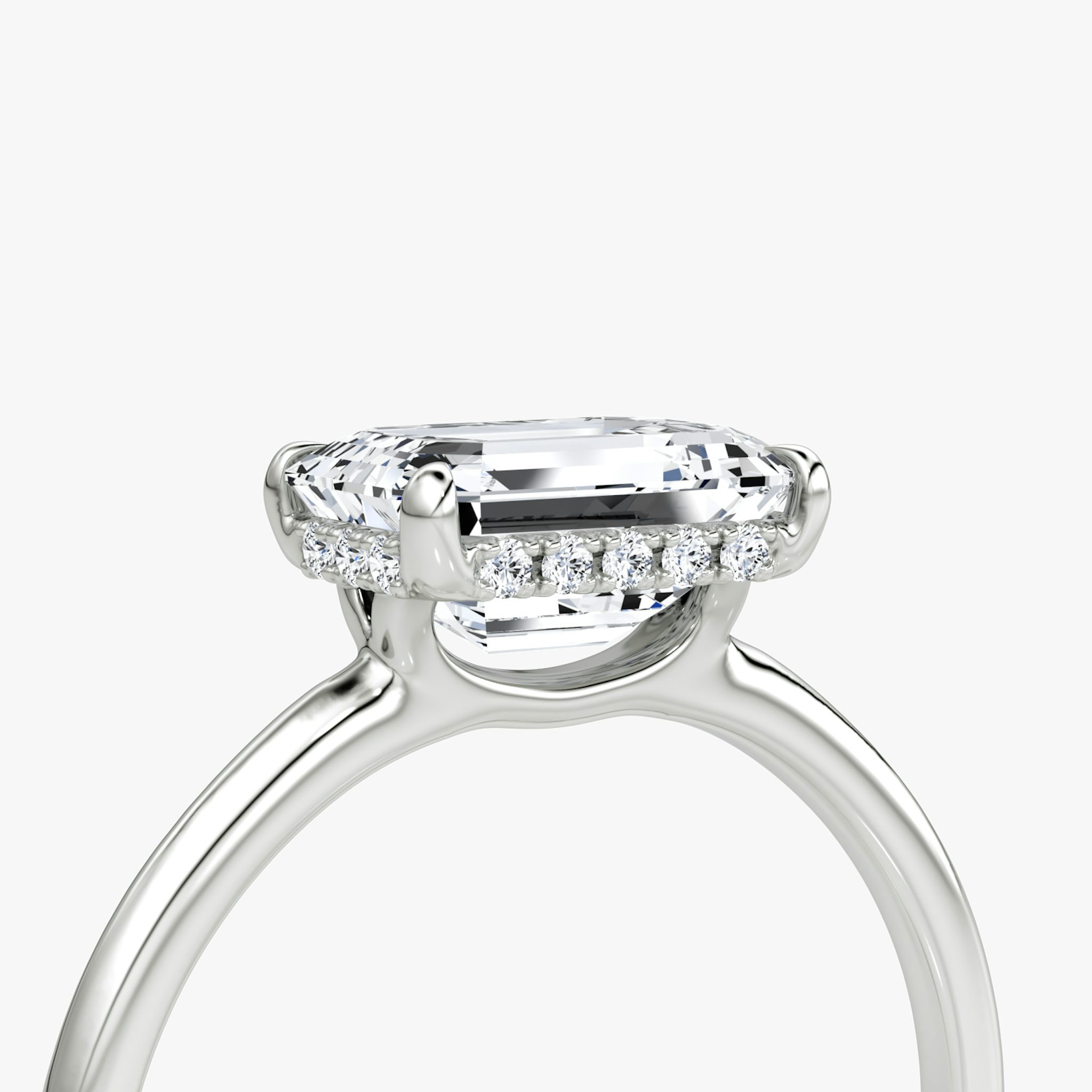 The Signature | Emerald | Platinum | bandAccent: Plain | bandWidth: standard | diamondOrientation: horizontal | hiddenHalo: yes | caratWeight: other