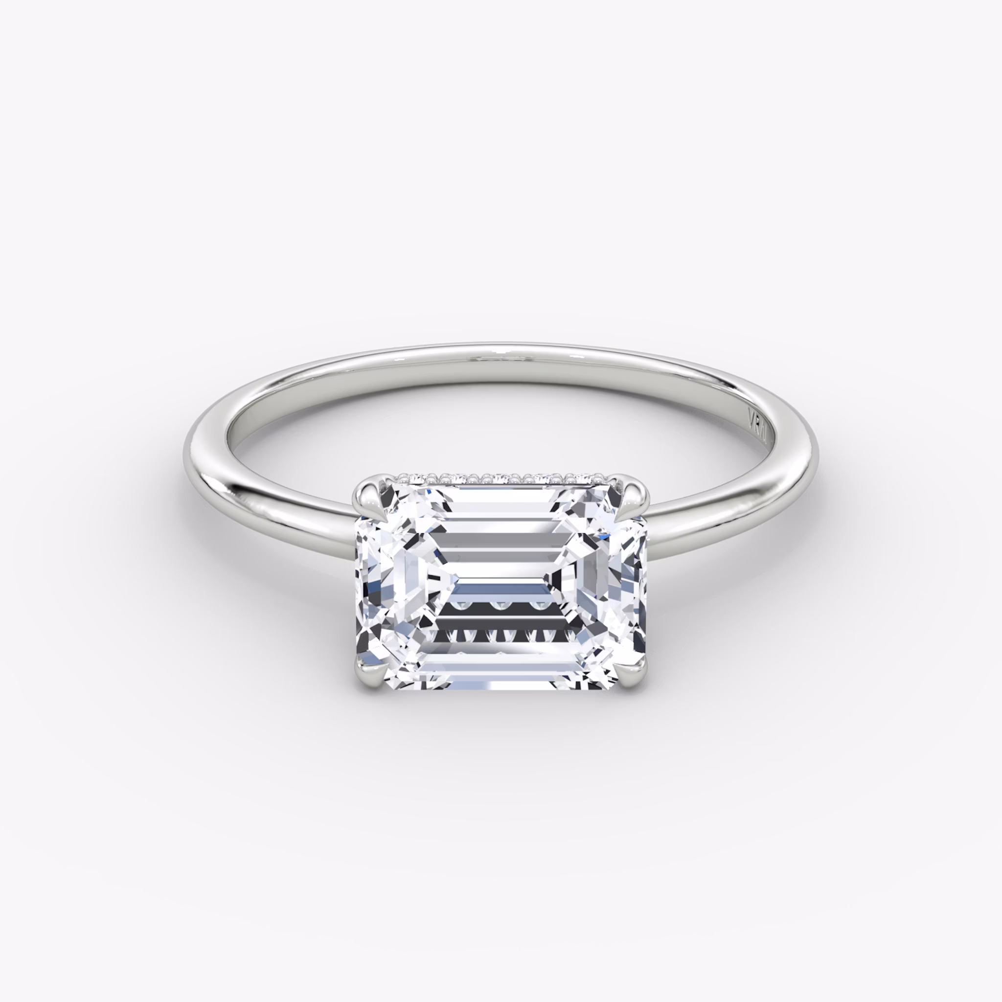 The Signature | Emerald | Platinum | bandAccent: Plain | bandWidth: standard | diamondOrientation: horizontal | hiddenHalo: yes | caratWeight: other