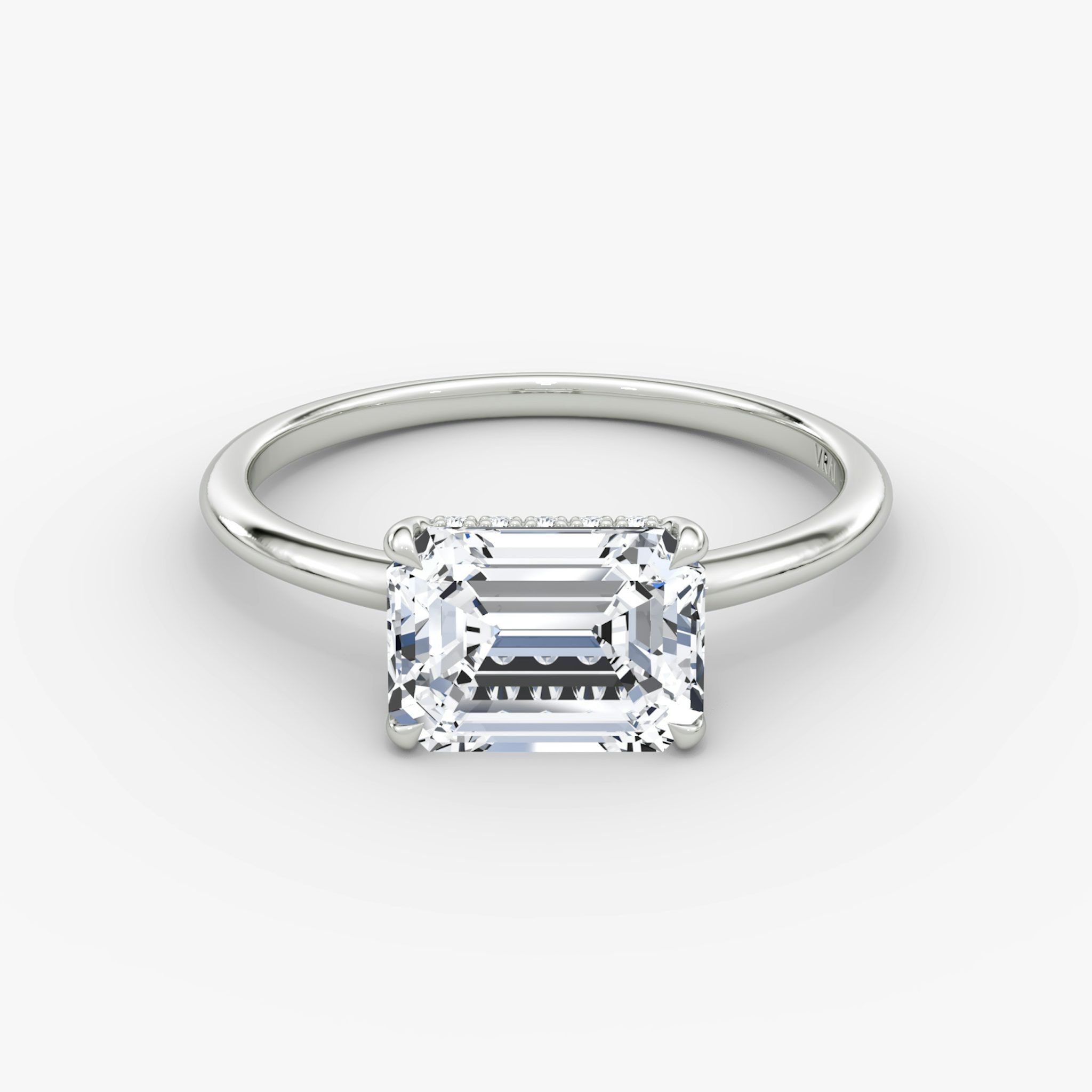 The Signature | Emerald | Platinum | bandAccent: Plain | bandWidth: standard | diamondOrientation: horizontal | hiddenHalo: yes | caratWeight: other