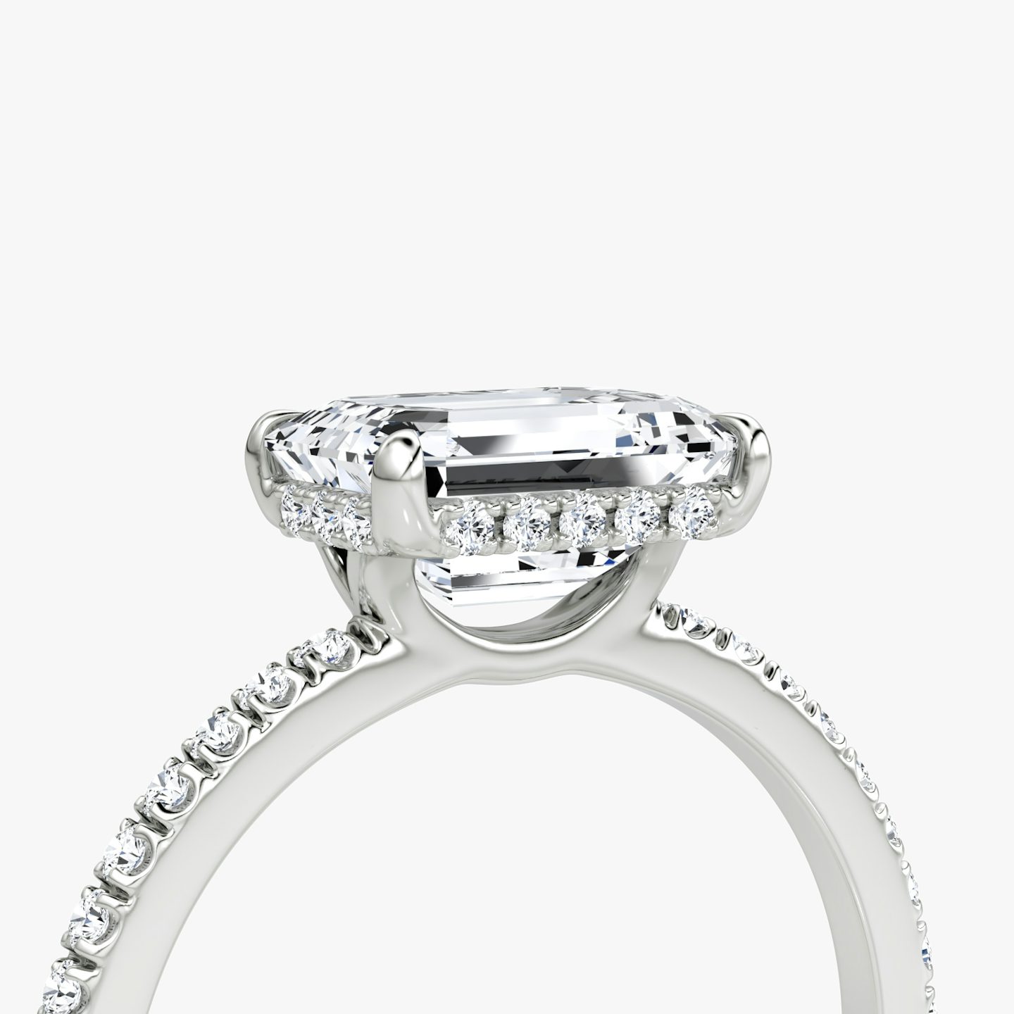 The Signature | Emerald | Platinum | bandAccent: Pavé | bandWidth: standard | diamondOrientation: horizontal | hiddenHalo: yes | caratWeight: other