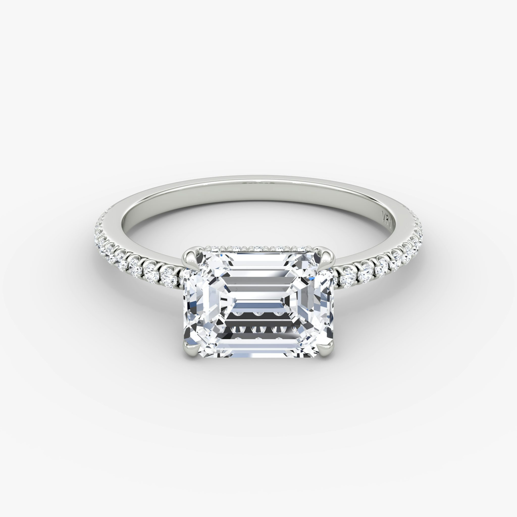 The Signature | Emerald | 18k | White Gold | bandAccent: Pavé | bandWidth: standard | diamondOrientation: horizontal | hiddenHalo: yes | caratWeight: other
