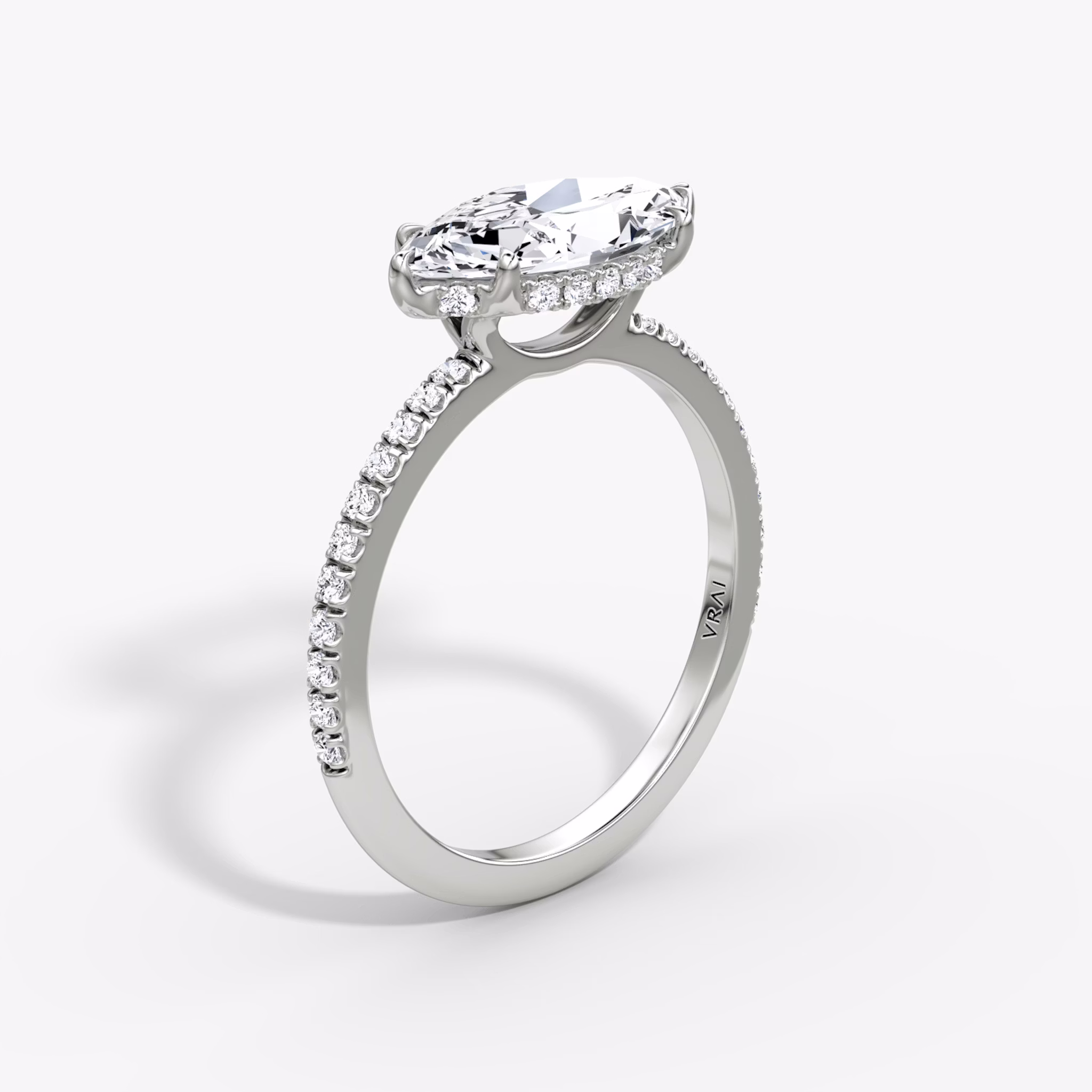 The Signature | Marquise | Platinum | bandAccent: Pavé | bandWidth: standard | diamondOrientation: horizontal | hiddenHalo: yes | caratWeight: other