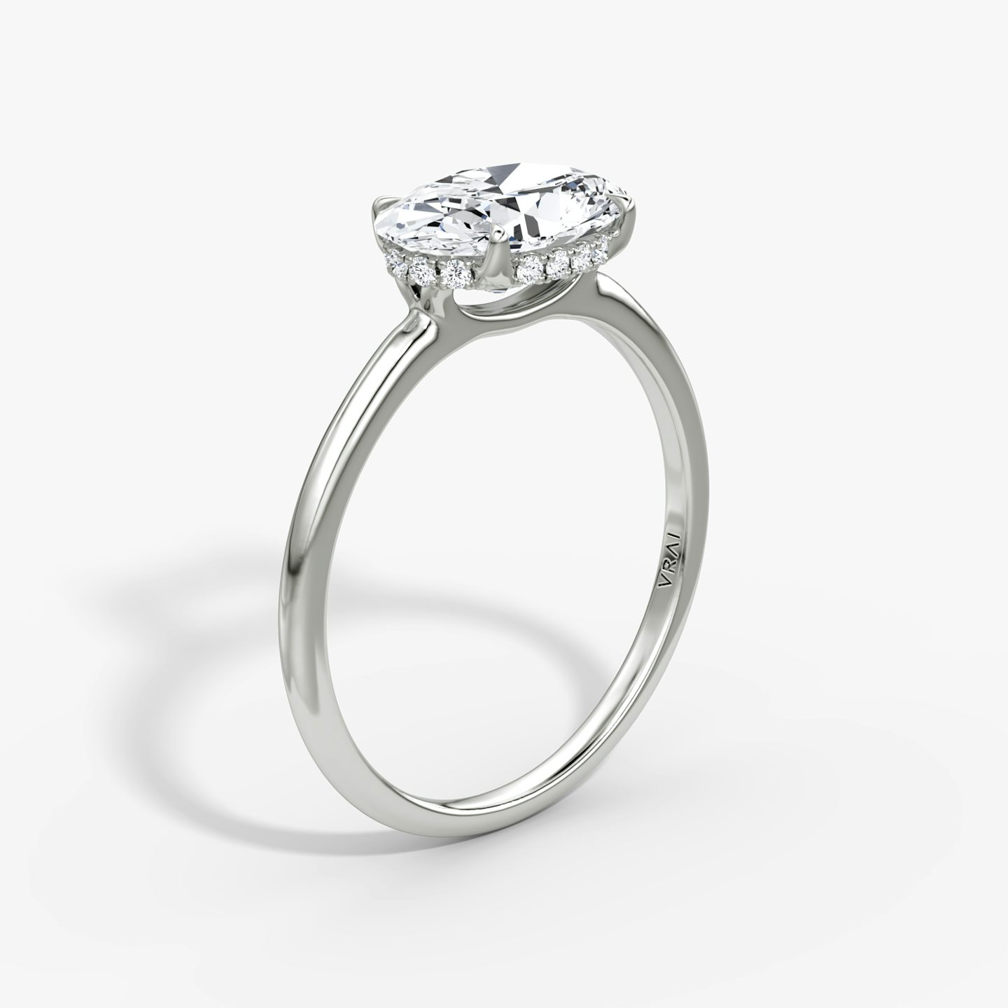 The Signature | Oval | Platinum | bandAccent: Plain | bandWidth: standard | diamondOrientation: horizontal | hiddenHalo: yes | caratWeight: other