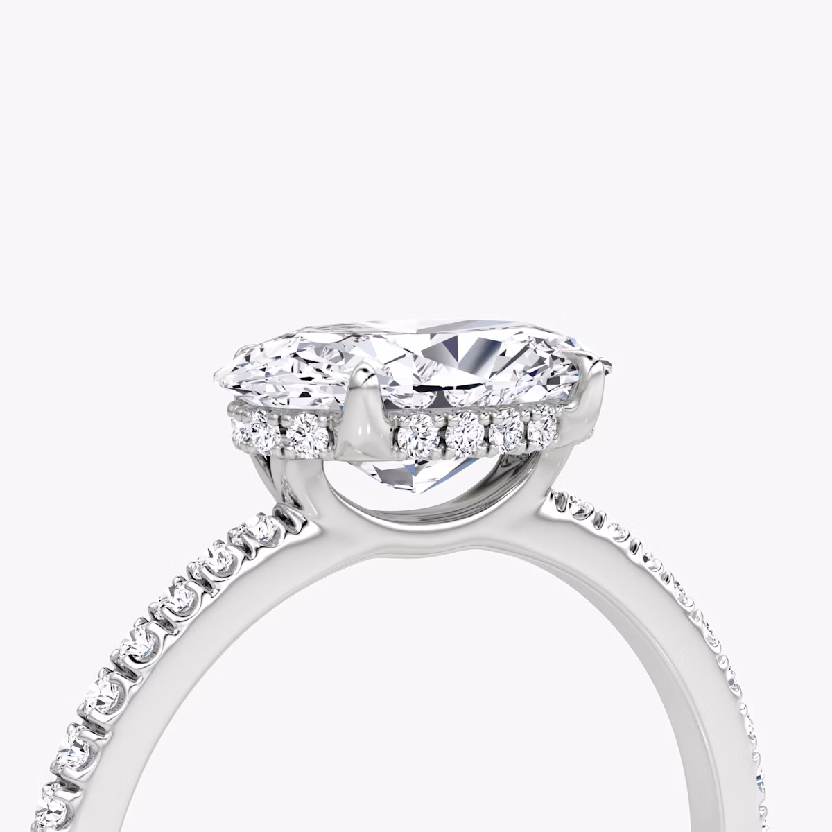 The Signature | Oval | Platinum | bandAccent: Pavé | bandWidth: standard | diamondOrientation: horizontal | hiddenHalo: yes | caratWeight: other