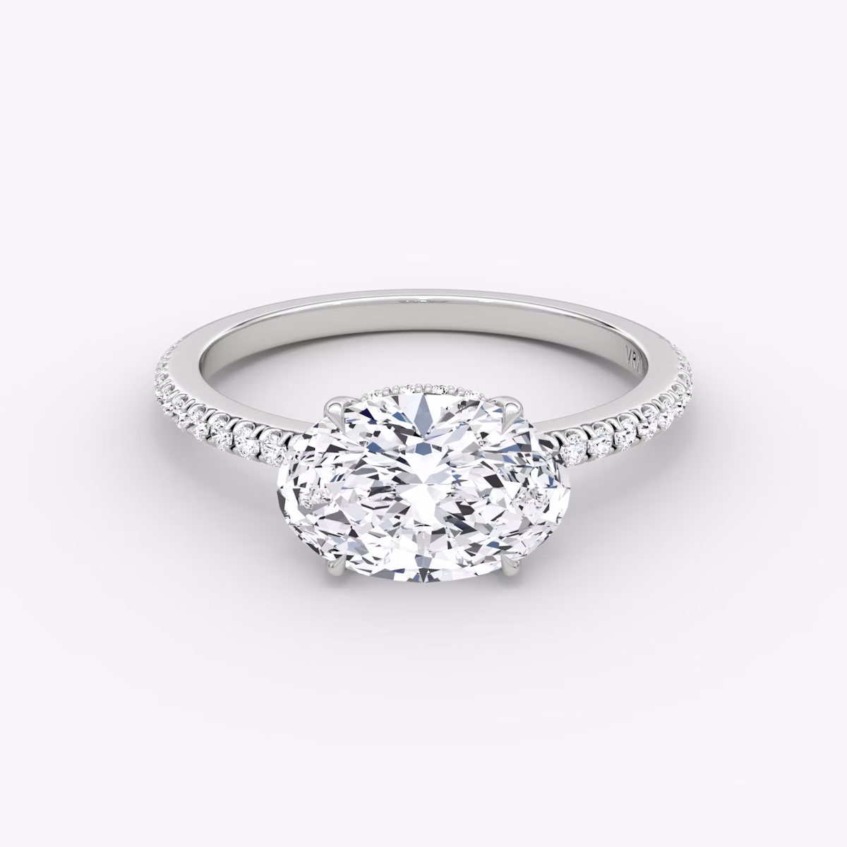 The Signature | Oval | Platinum | bandAccent: Pavé | bandWidth: standard | diamondOrientation: horizontal | hiddenHalo: yes | caratWeight: other