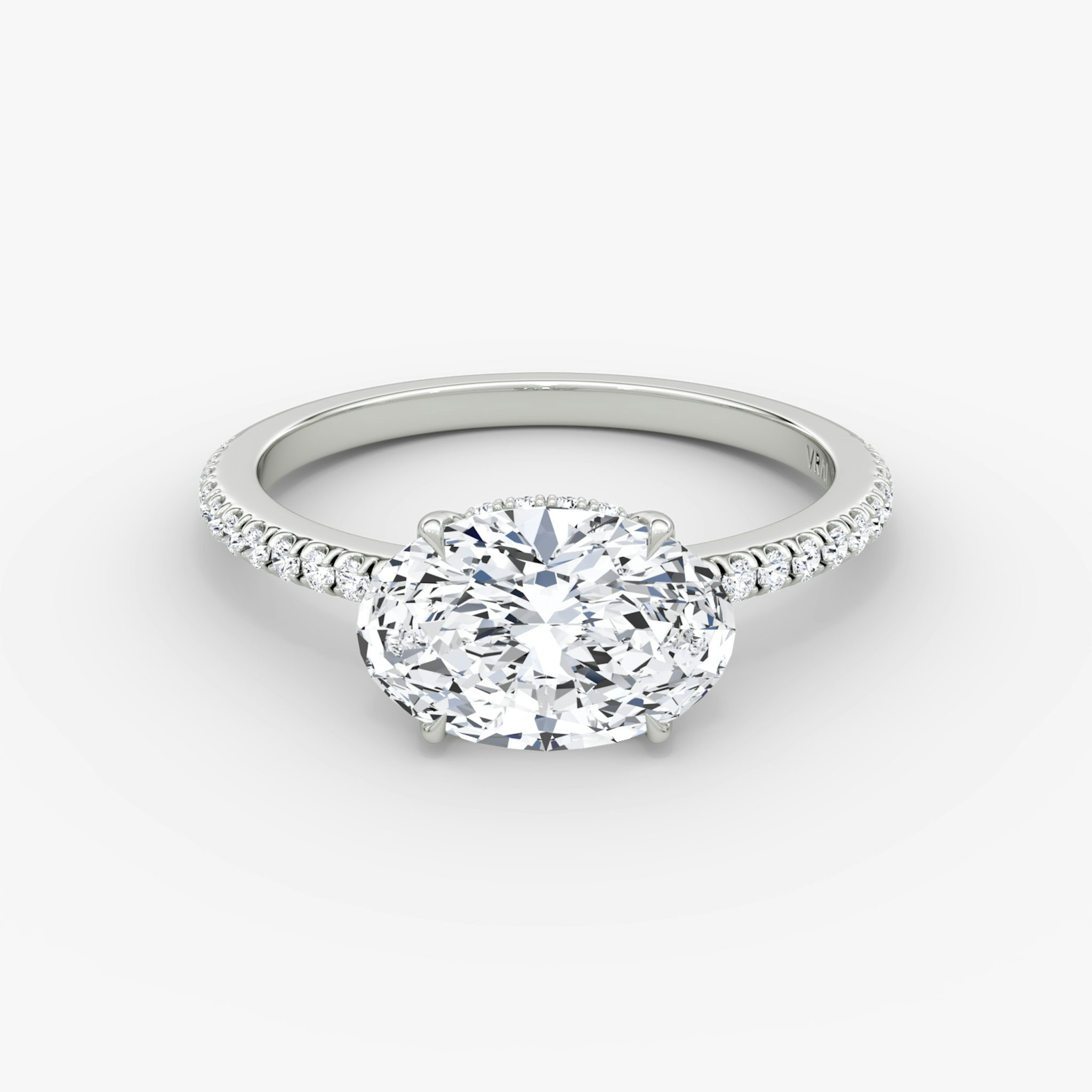 The Signature | Oval | 18k | White Gold | bandAccent: Pavé | bandWidth: standard | diamondOrientation: horizontal | hiddenHalo: yes | caratWeight: other