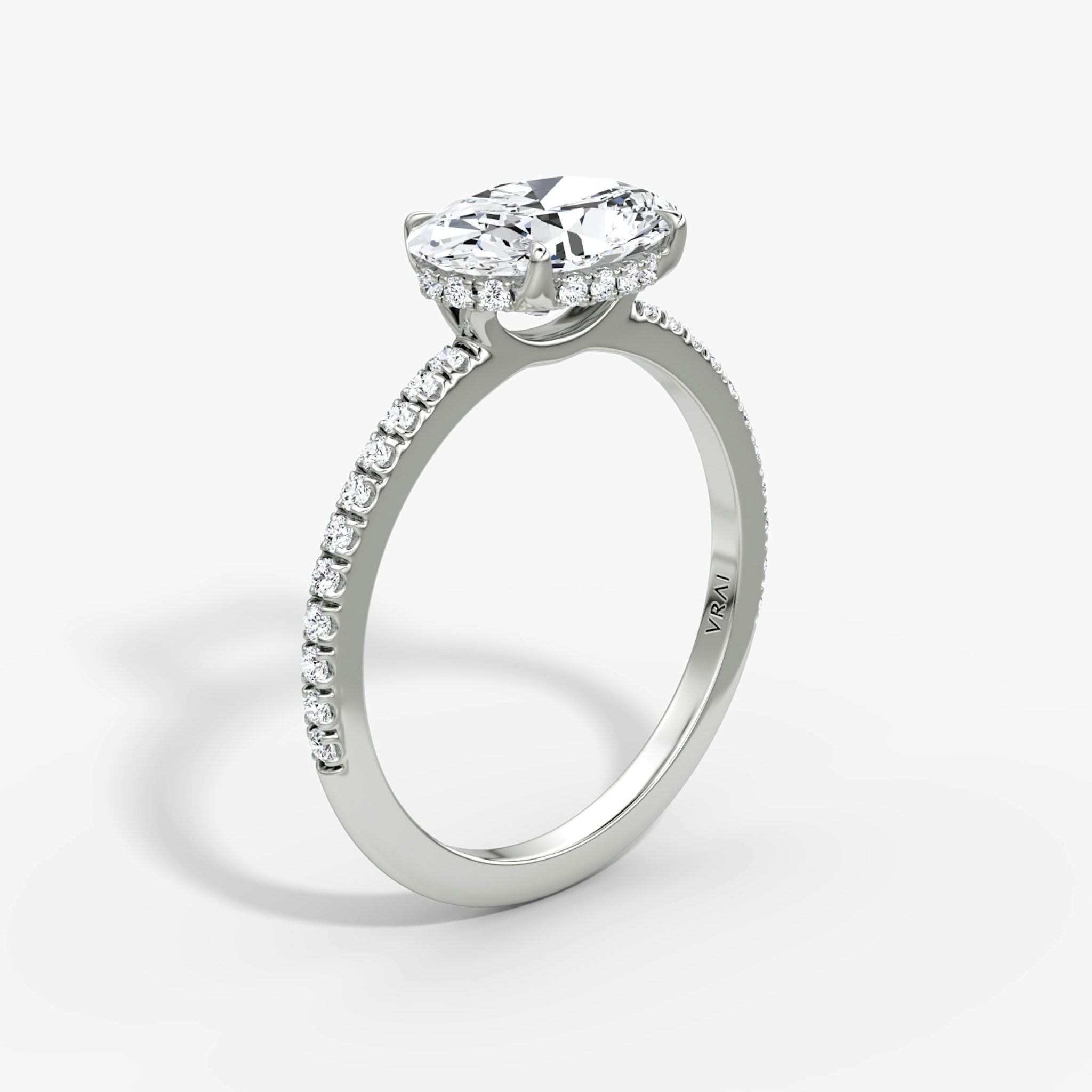 The Signature | Oval | 18k | White Gold | bandAccent: Pavé | bandWidth: standard | diamondOrientation: horizontal | hiddenHalo: yes | caratWeight: other