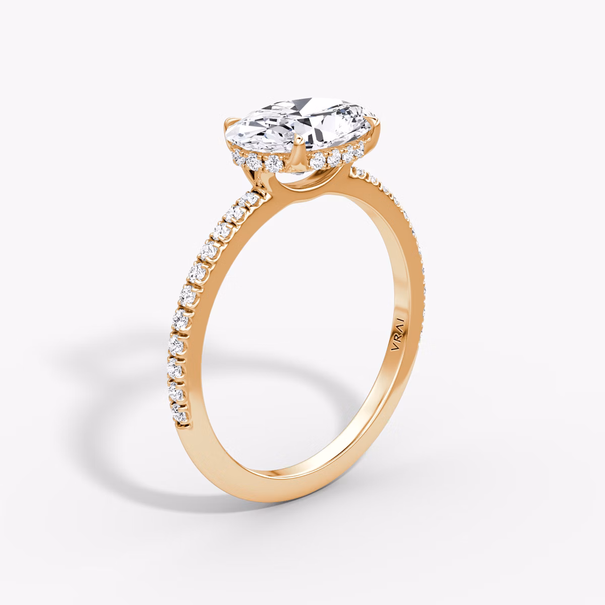 The Signature | Oval | 14k | Rose Gold | bandAccent: Pavé | bandWidth: standard | diamondOrientation: horizontal | hiddenHalo: yes | caratWeight: other
