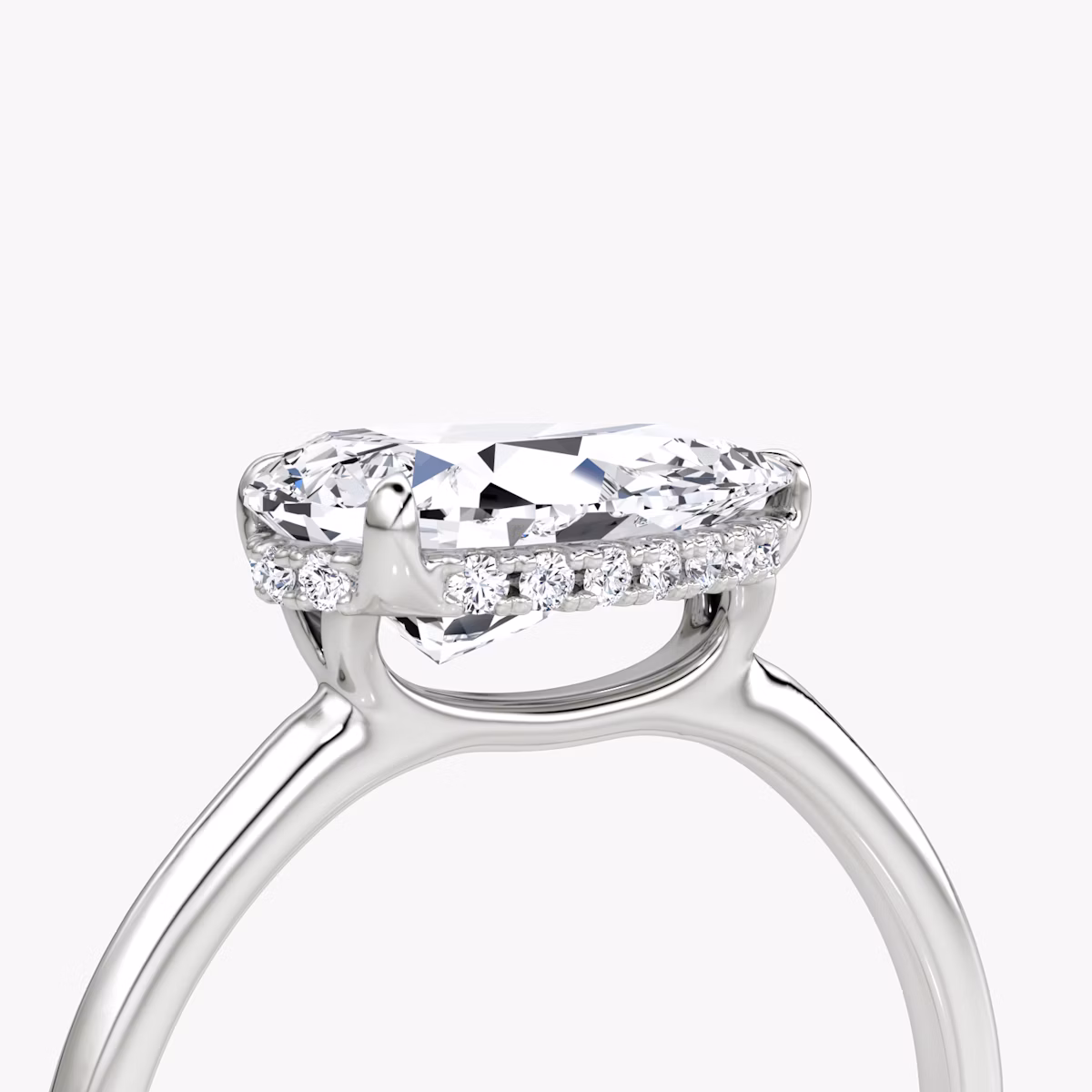 The Signature | Pear | Platinum | bandAccent: Plain | bandWidth: standard | diamondOrientation: horizontal | hiddenHalo: yes | caratWeight: other