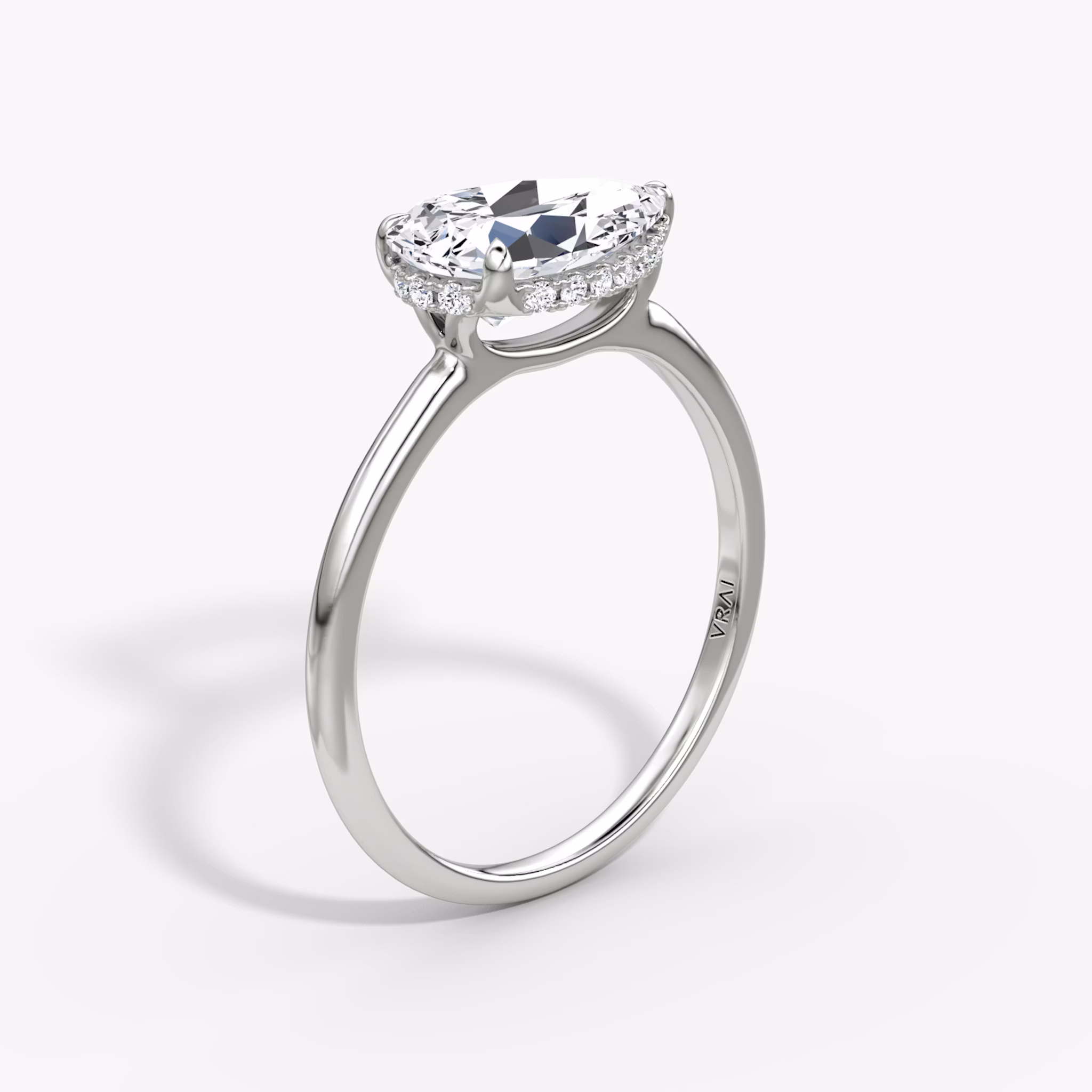 The Signature | Pear | Platinum | bandAccent: Plain | bandWidth: standard | diamondOrientation: horizontal | hiddenHalo: yes | caratWeight: other