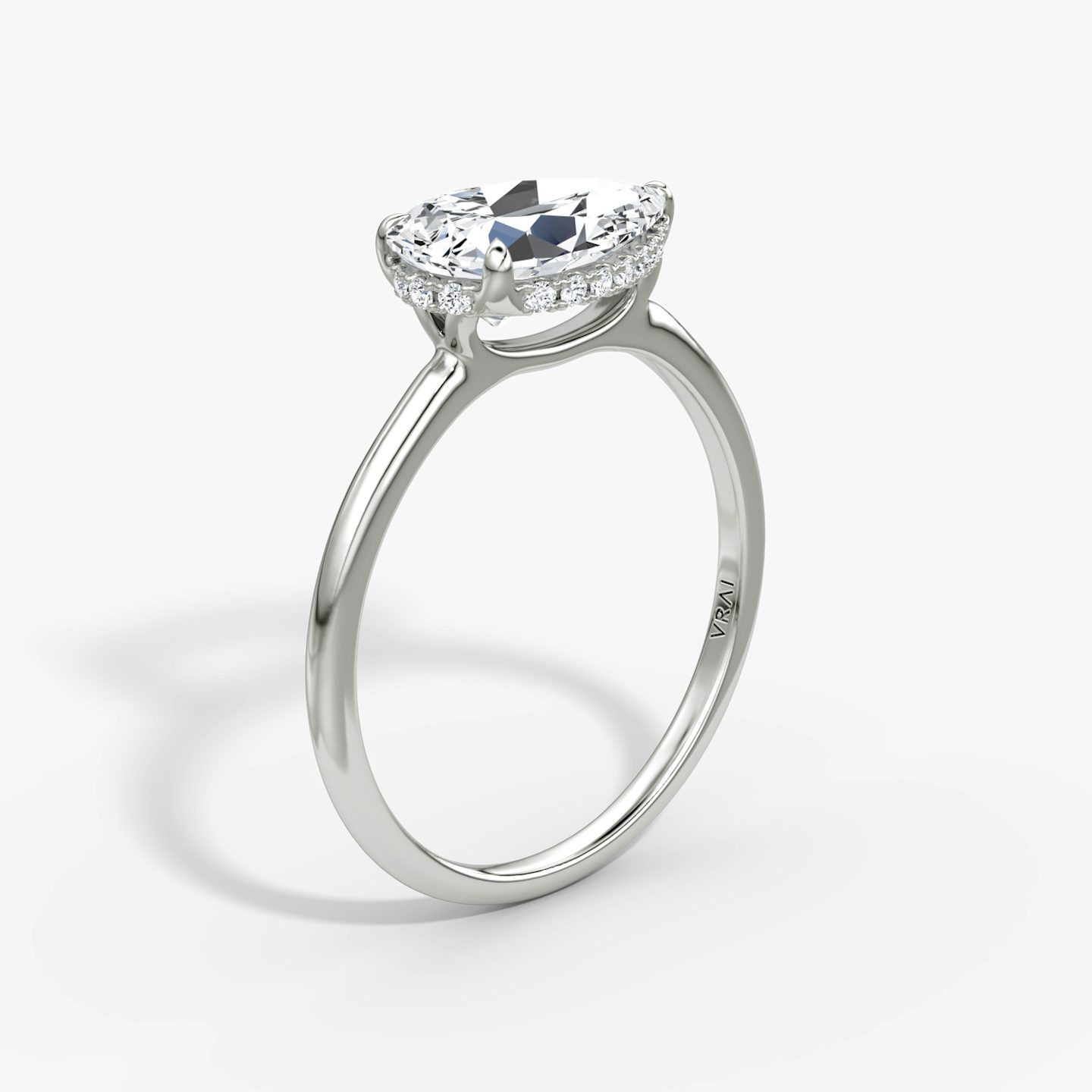 The Signature | Pear | Platinum | bandAccent: Plain | bandWidth: standard | diamondOrientation: horizontal | hiddenHalo: yes | caratWeight: other