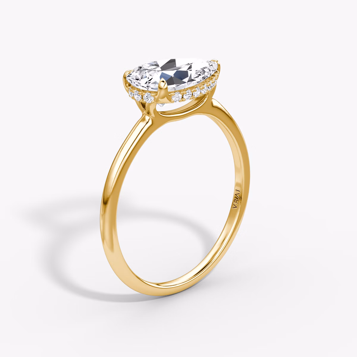 The Signature | Pear | 18k | Yellow Gold | bandAccent: Plain | bandWidth: standard | diamondOrientation: horizontal | hiddenHalo: yes | caratWeight: other