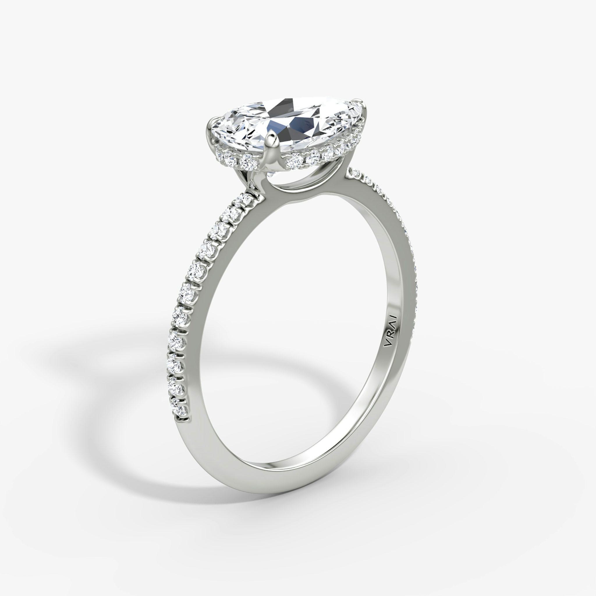 The Signature | Pear | 18k | White Gold | bandAccent: Pavé | bandWidth: standard | diamondOrientation: horizontal | hiddenHalo: yes | caratWeight: other