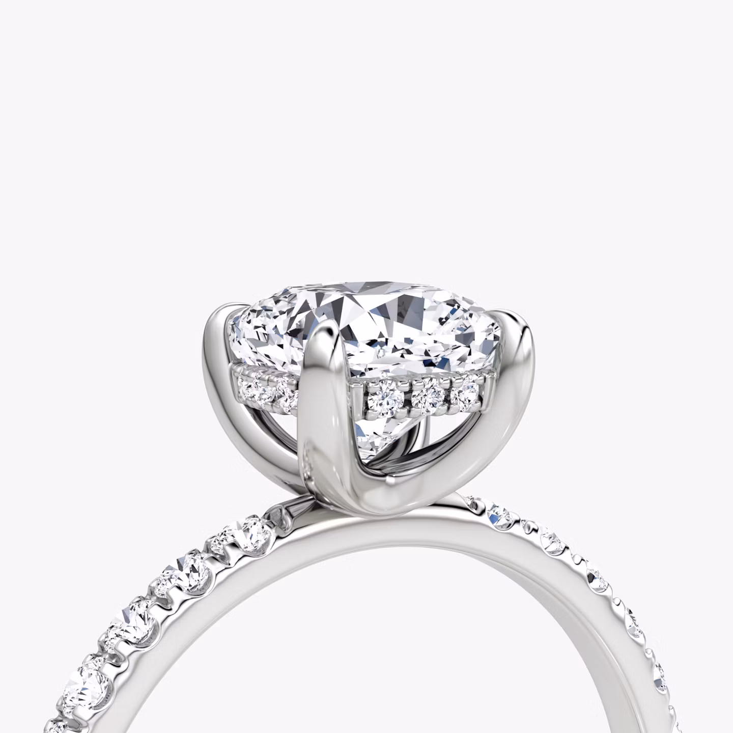 The Classic Hidden Halo | Cushion | Platinum | bandAccent: Pavé | bandWidth: large | prongStyle: Plain | diamondOrientation: vertical | caratWeight: other
