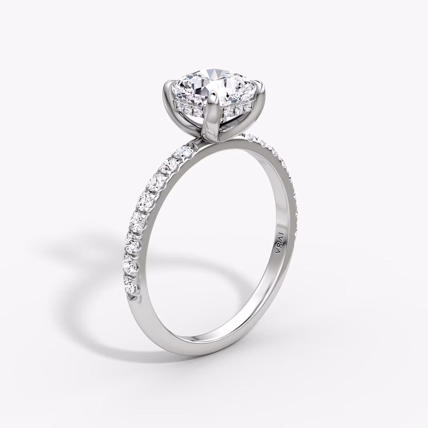 The Classic Hidden Halo | Cushion | Platinum | bandAccent: Pavé | bandWidth: large | prongStyle: Plain | diamondOrientation: vertical | caratWeight: other