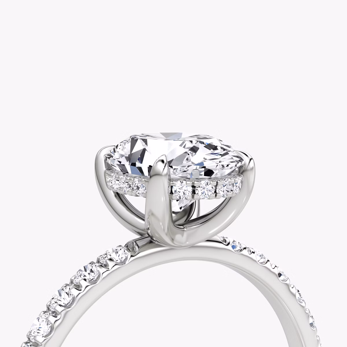 The Classic Hidden Halo | Oval | Platinum | bandAccent: Pavé | bandWidth: large | prongStyle: Plain | diamondOrientation: vertical | caratWeight: other