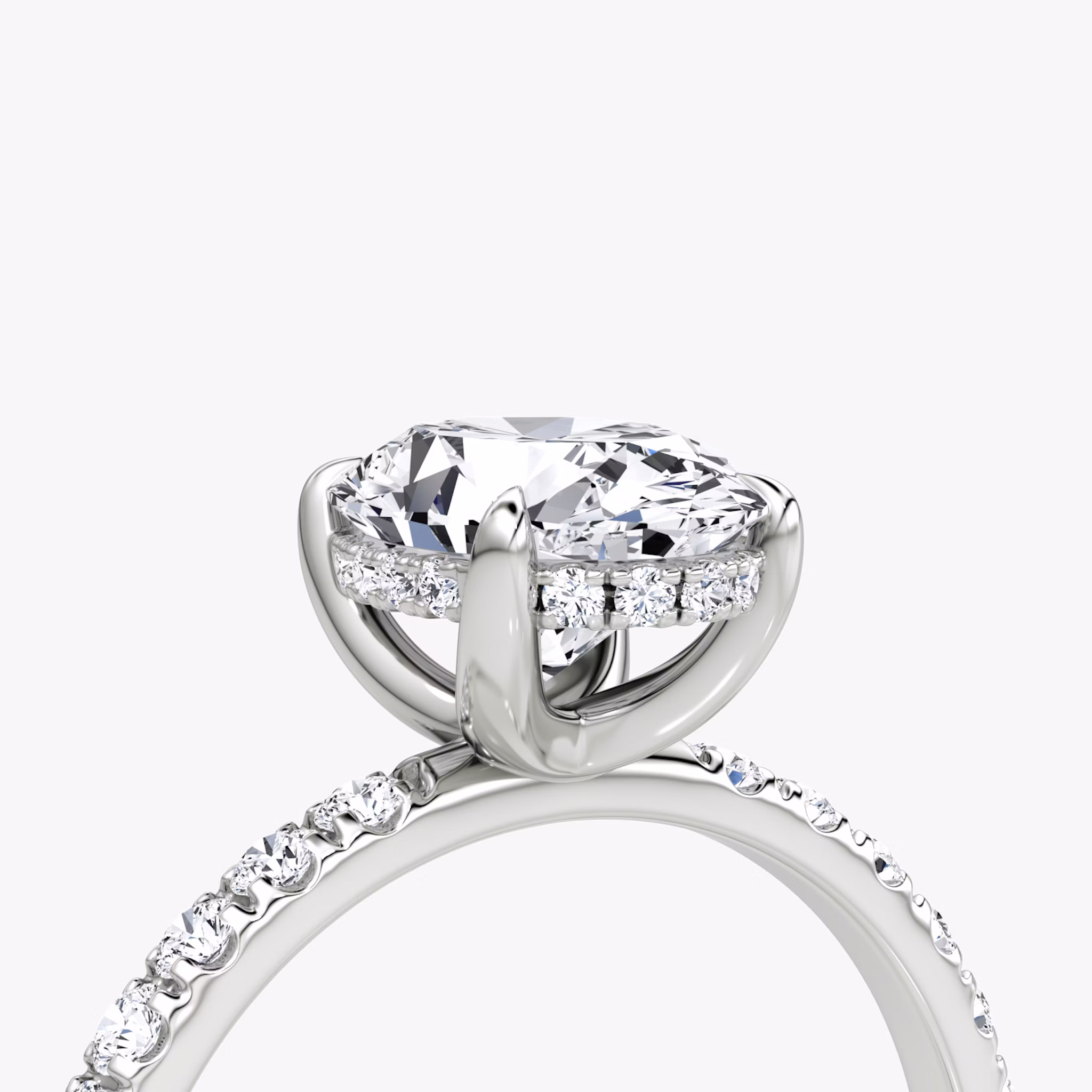 The Classic Hidden Halo | Oval | 18k | White Gold | bandAccent: Pavé | bandWidth: large | prongStyle: Plain | diamondOrientation: vertical | caratWeight: other