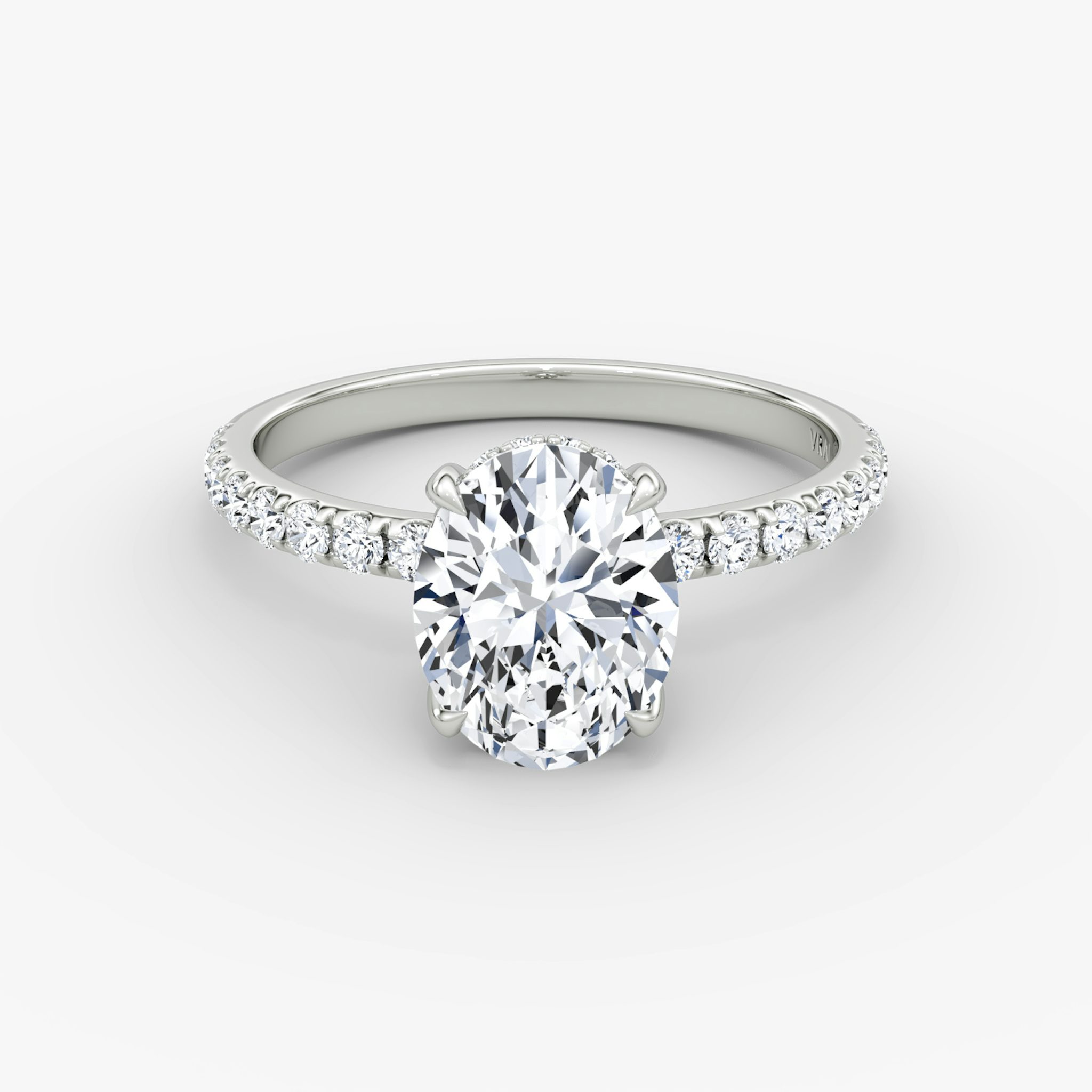 The Classic Hidden Halo | Oval | 18k | White Gold | bandAccent: Pavé | bandWidth: large | prongStyle: Plain | diamondOrientation: vertical | caratWeight: other